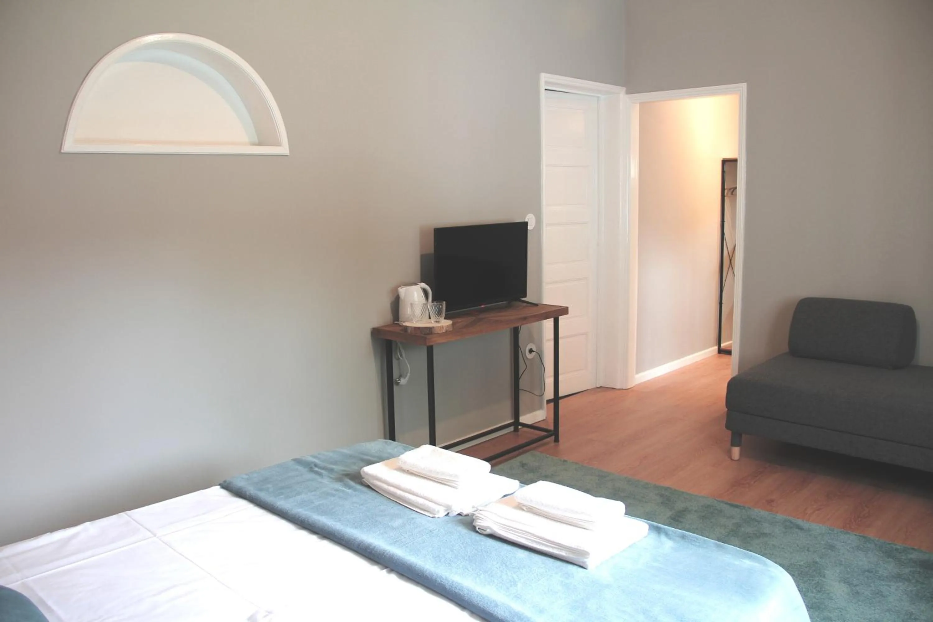 TV and multimedia in Genius Loci Guesthouse