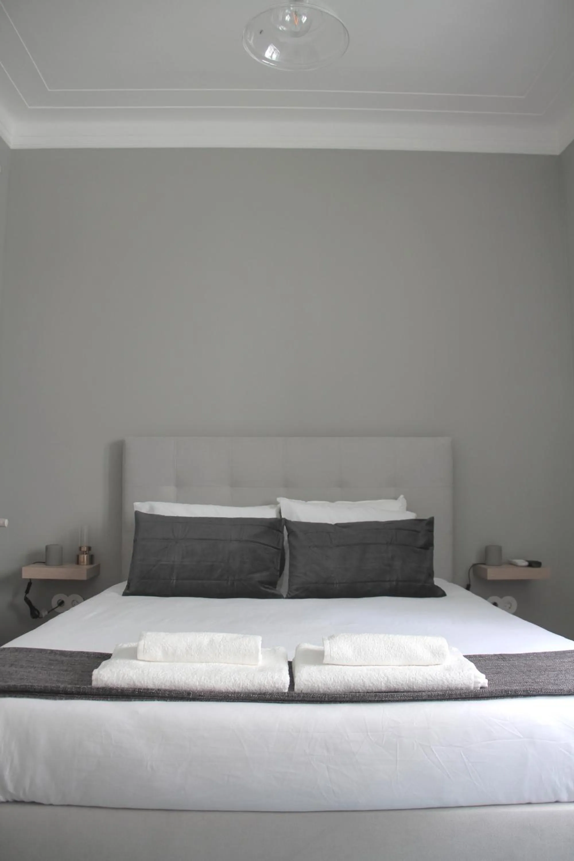 Bed in Genius Loci Guesthouse