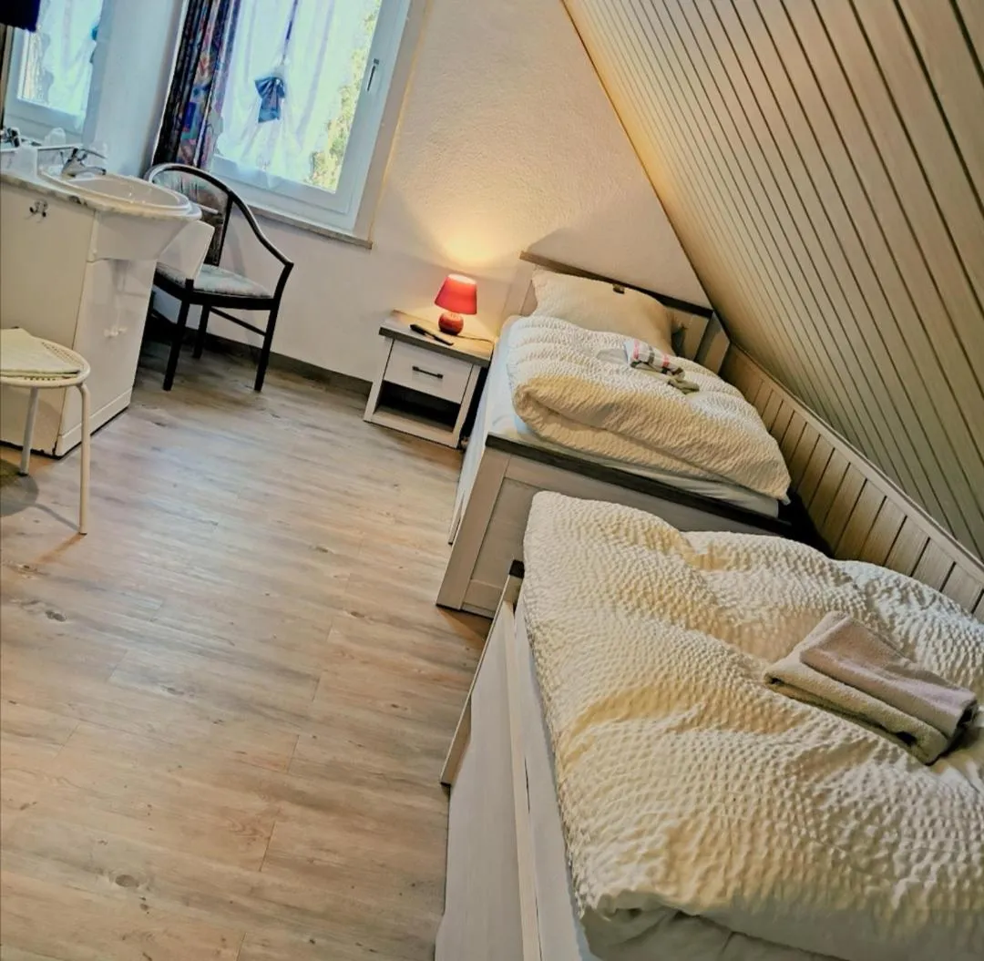 Photo of the whole room, Bed in Landhotel Heidkrug