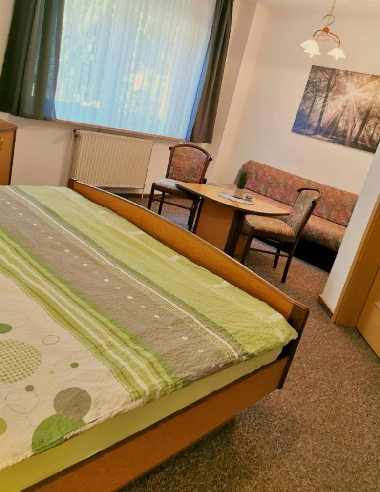 Photo of the whole room, Bed in Landhotel Heidkrug