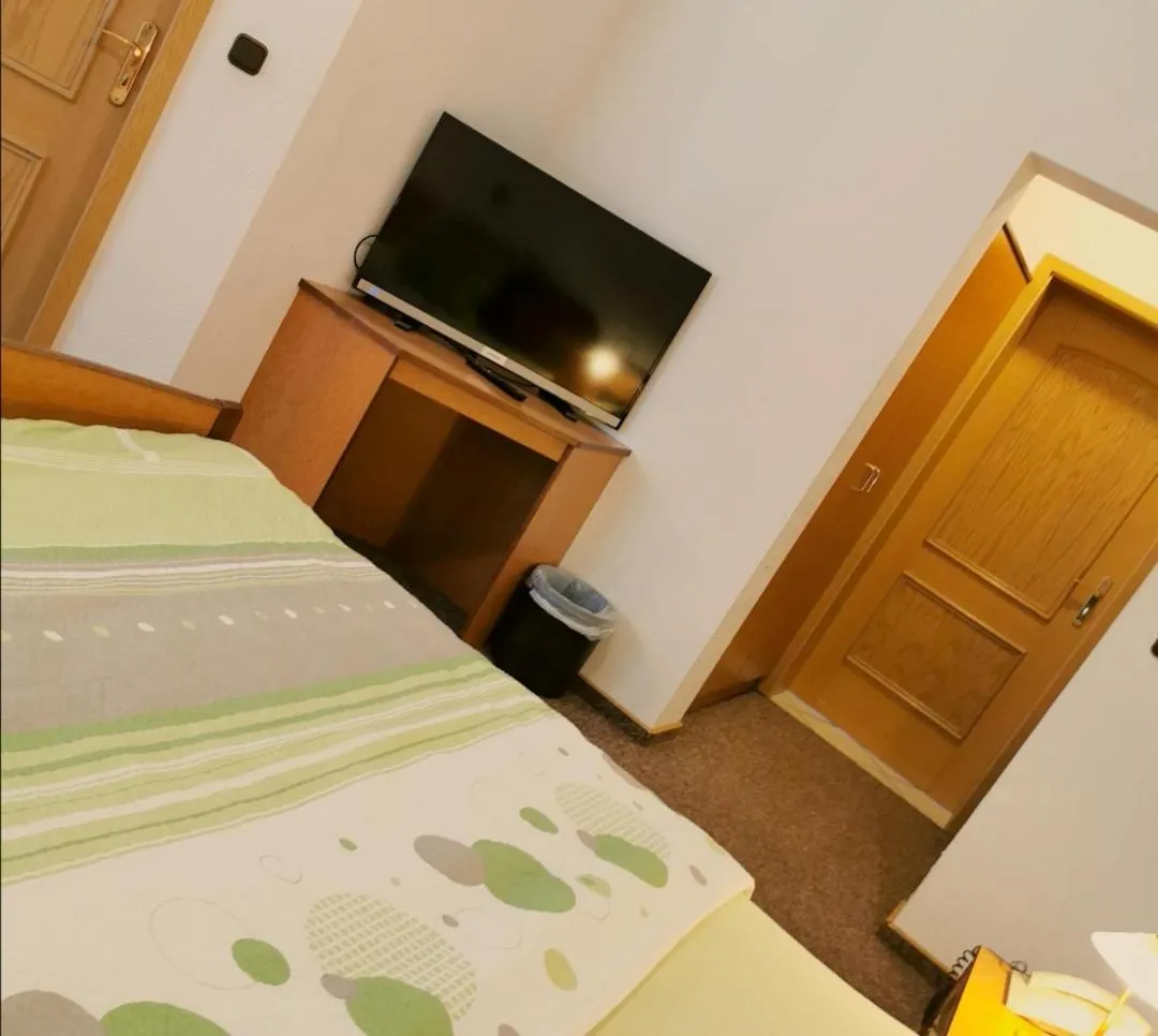 Photo of the whole room, Bed in Landhotel Heidkrug