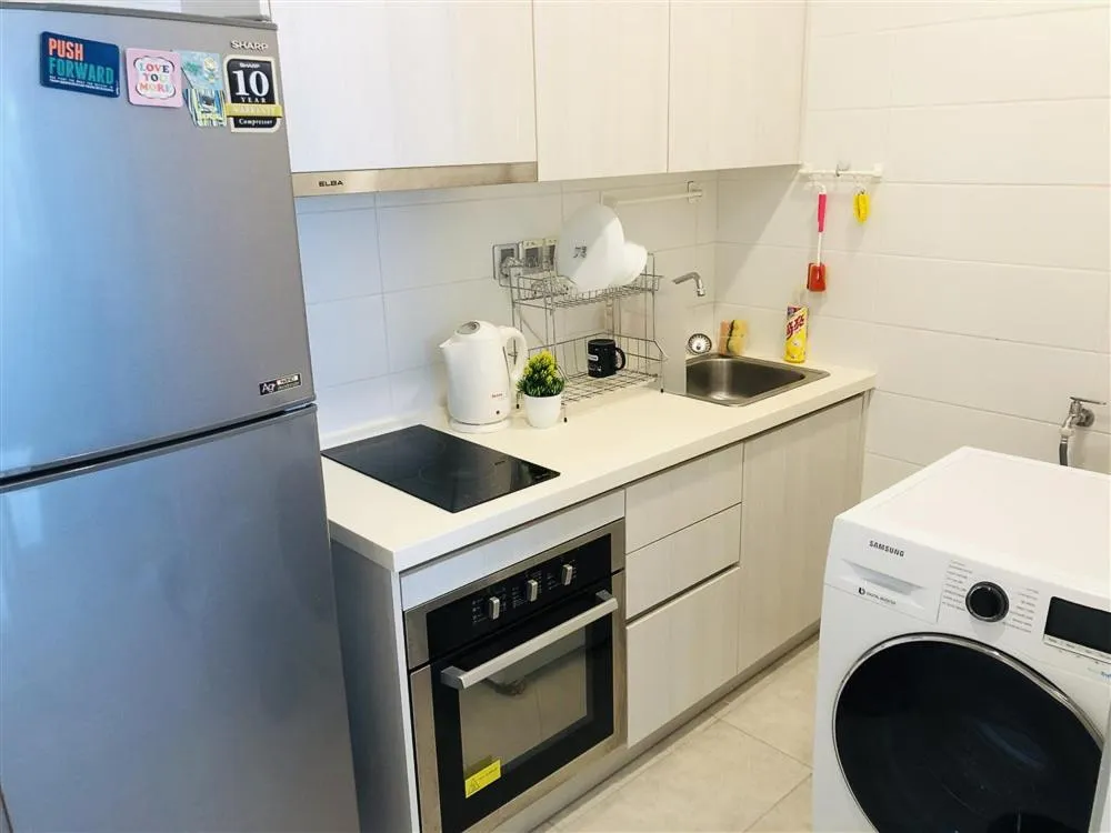 Kitchen or kitchenette in Paragon Suite Homestay by Antlerzone