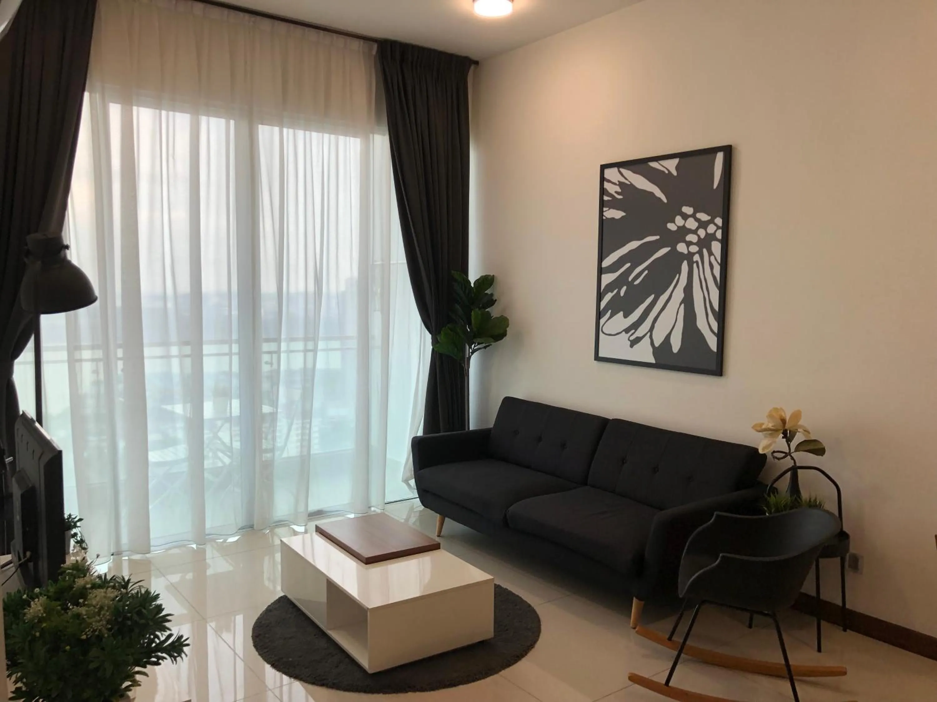 Living room in Paragon Suite Homestay by Antlerzone