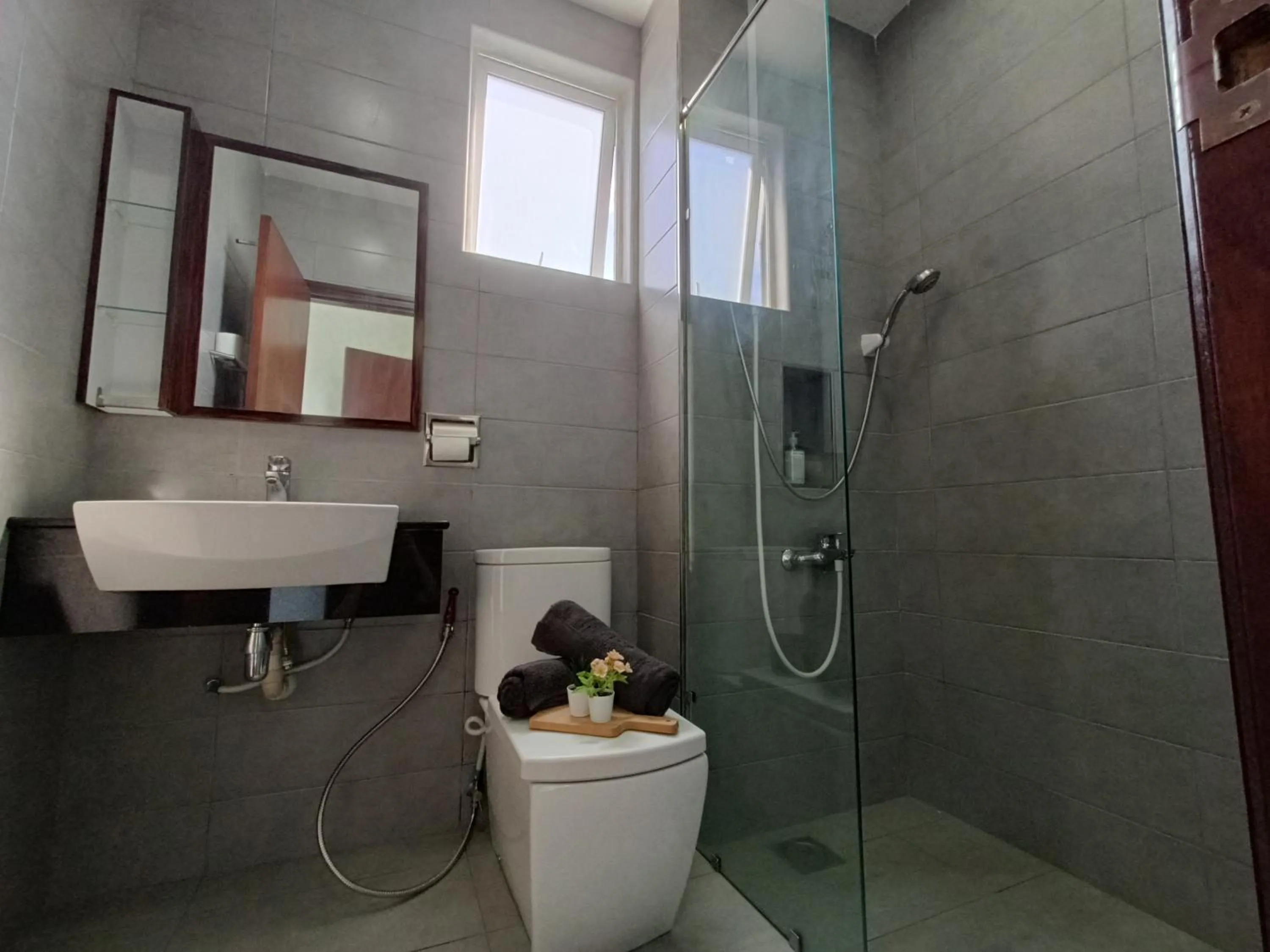 Bathroom in Paragon Suite Homestay by Antlerzone