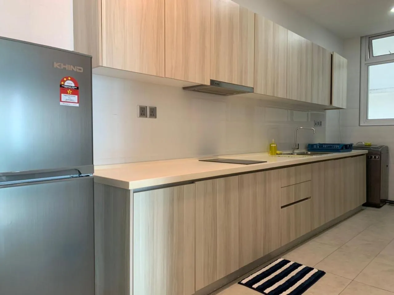 Kitchen or kitchenette in Paragon Suite Homestay by Antlerzone