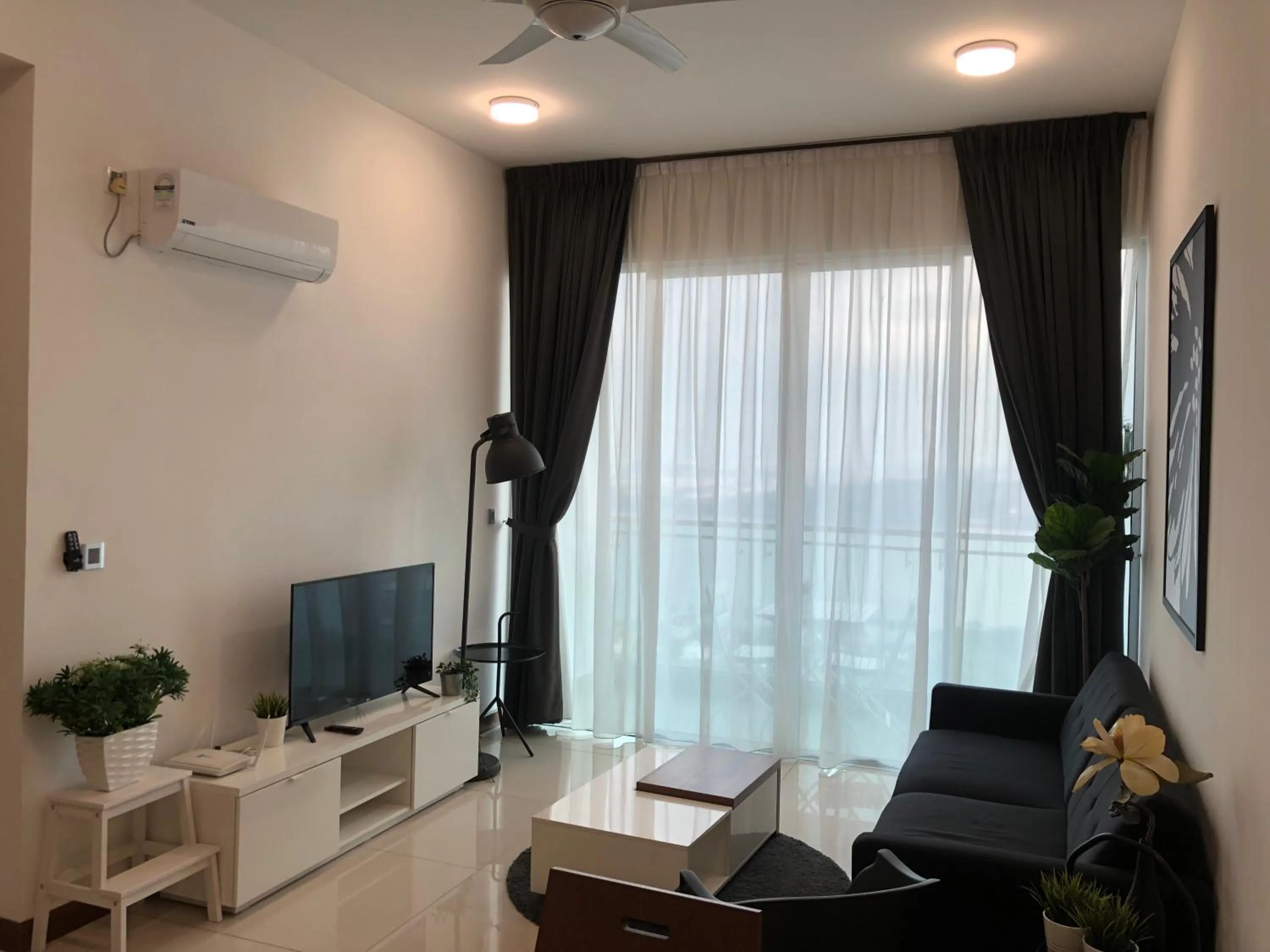 Living room in Paragon Suite Homestay by Antlerzone