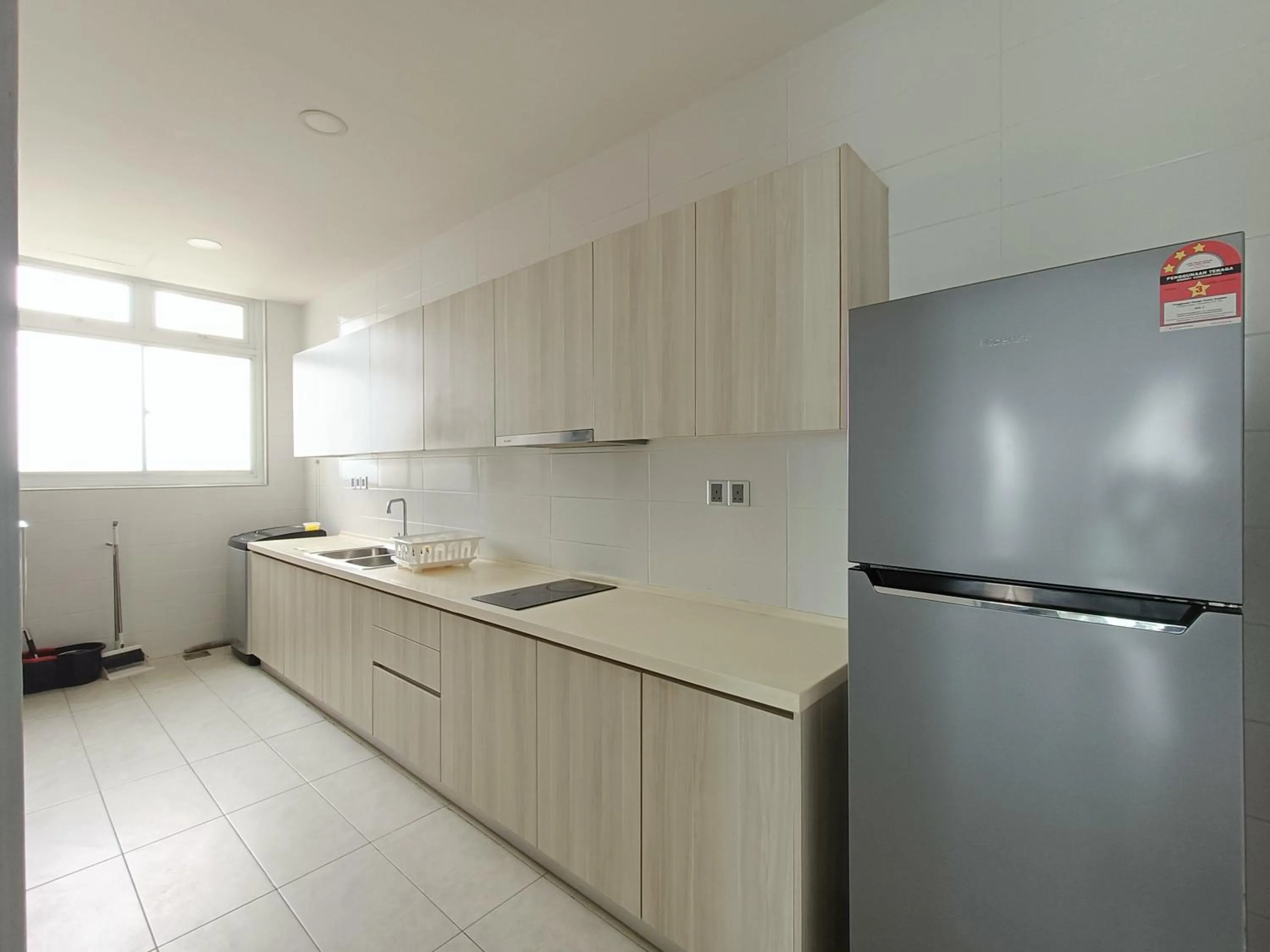 Kitchen or kitchenette in Paragon Suite Homestay by Antlerzone