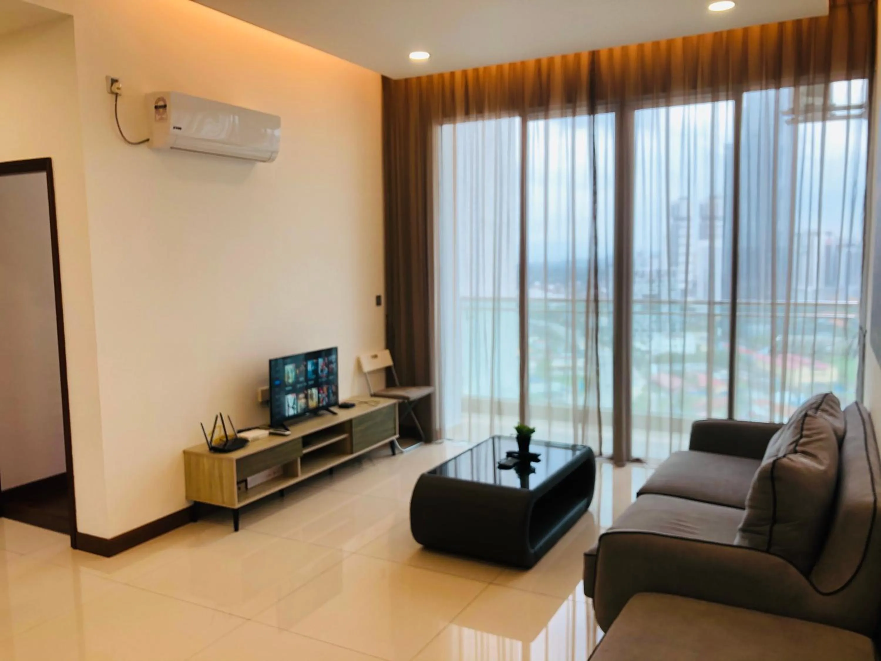 Living room in Paragon Suite Homestay by Antlerzone