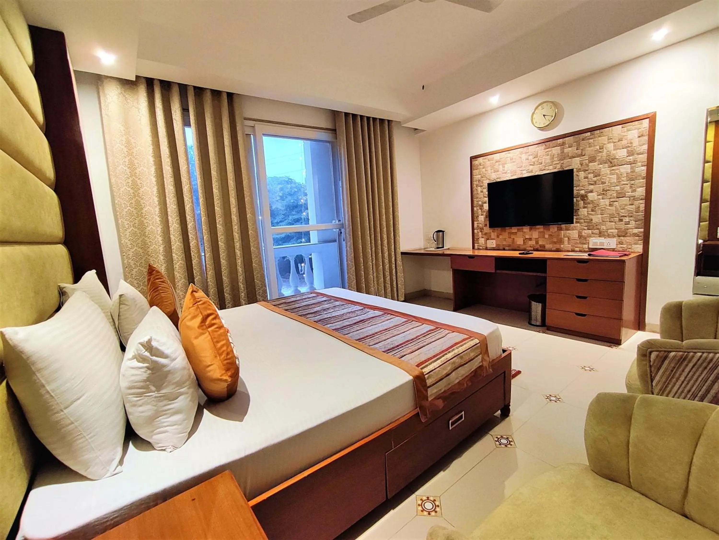 Photo of the whole room, Bed in The Angel Hotel & Suites near Medanta