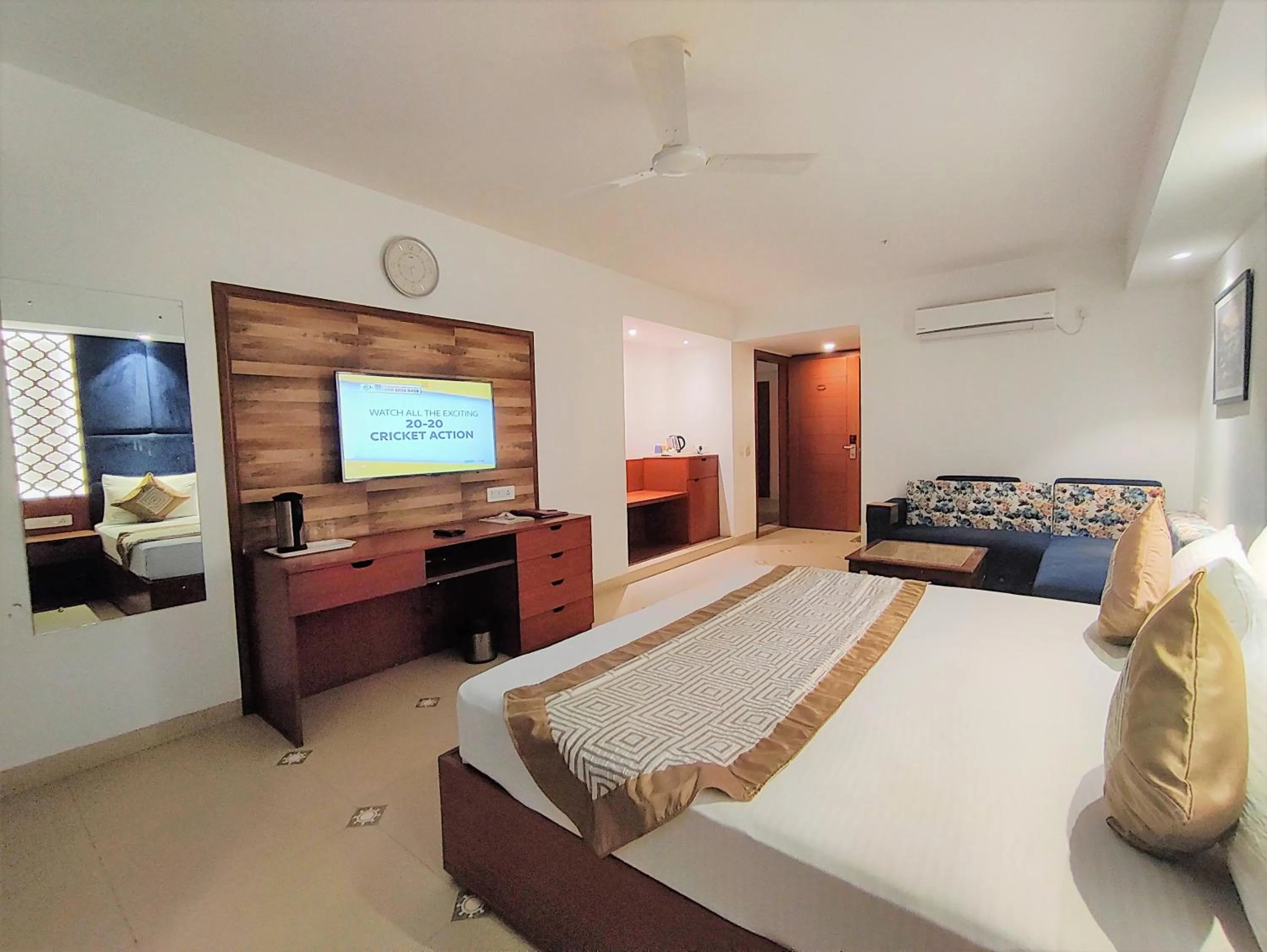 Seating area, Bed in The Angel Hotel & Suites near Medanta