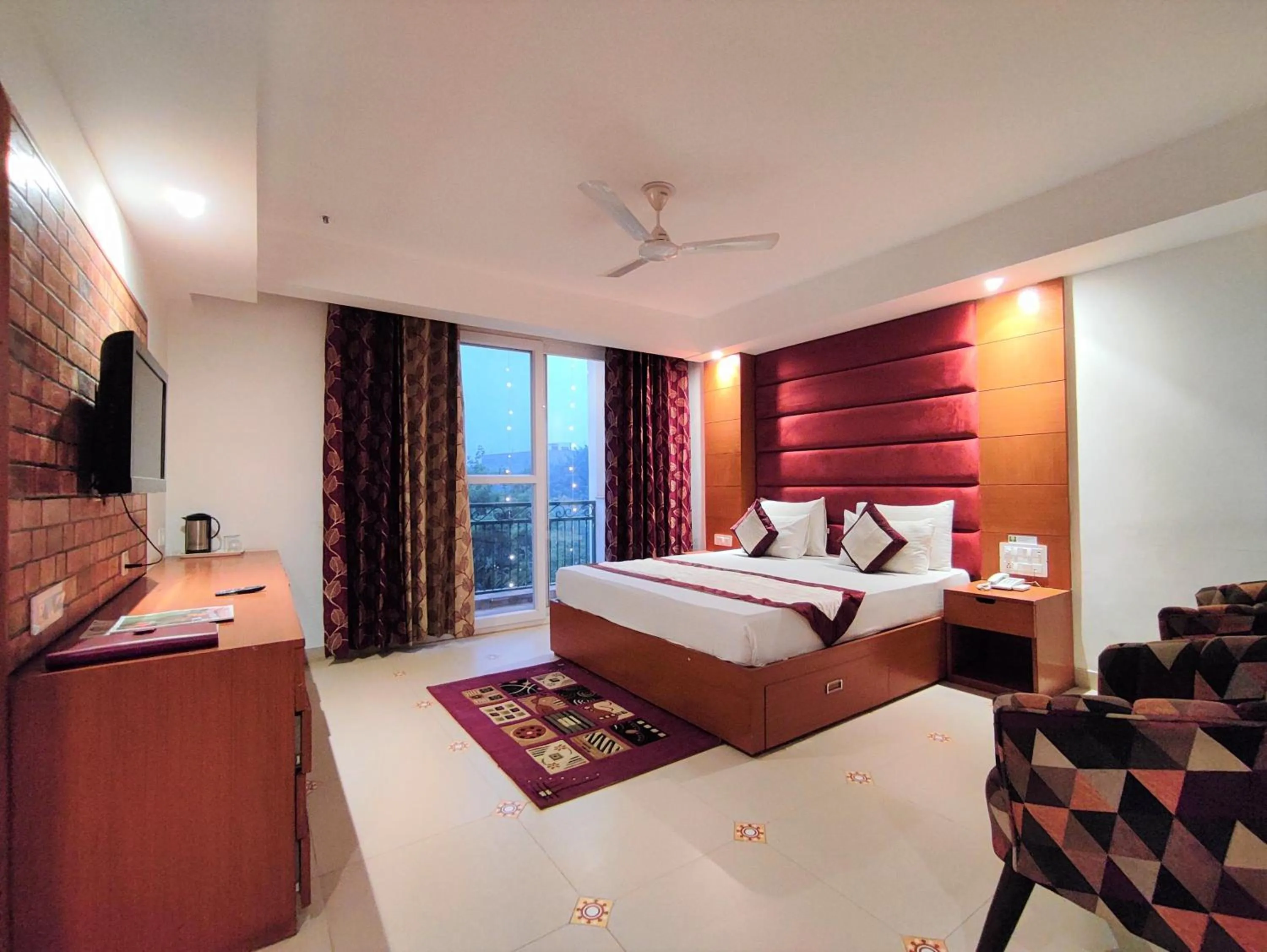 Photo of the whole room, Bed in The Angel Hotel & Suites near Medanta