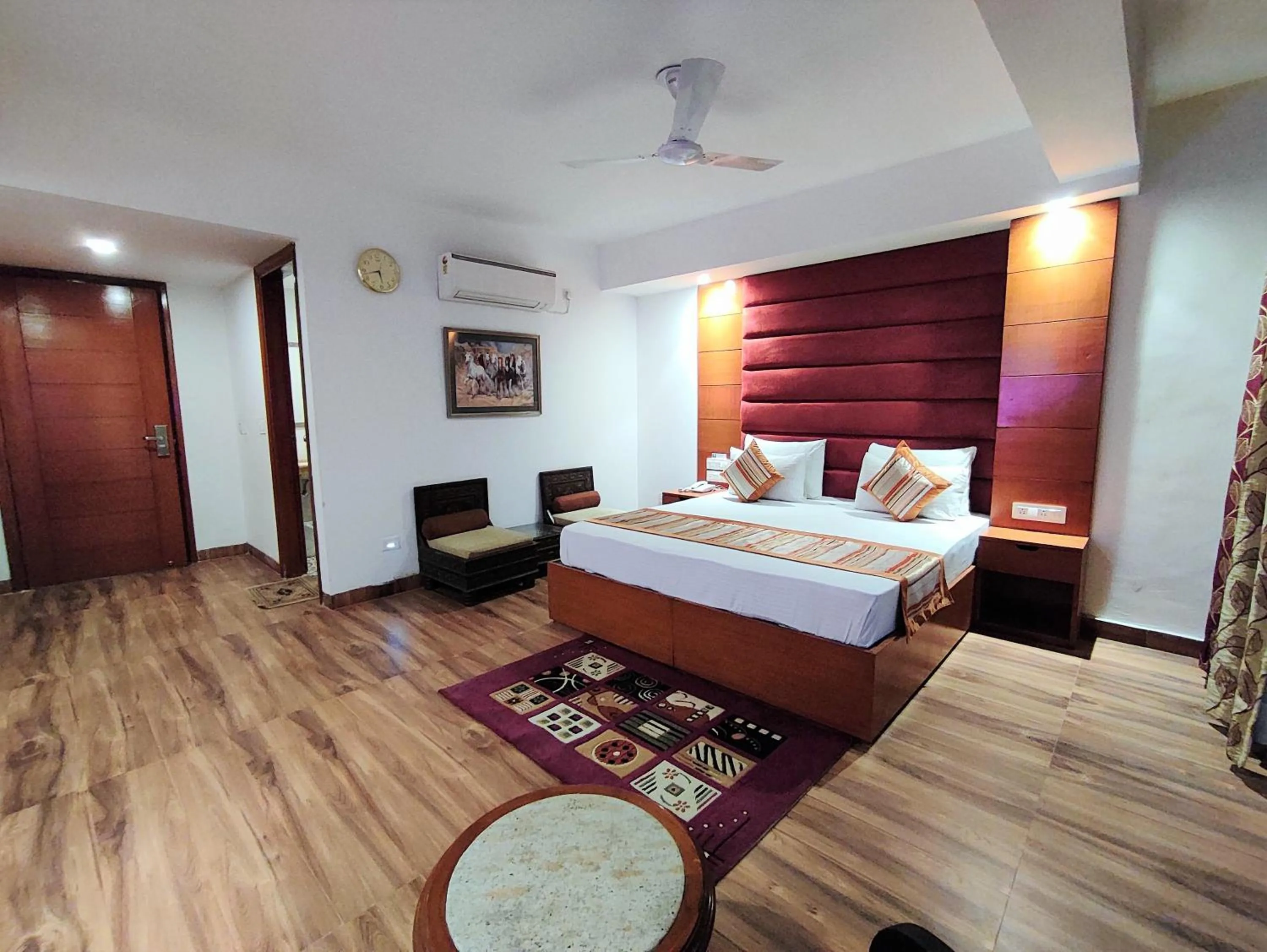 Photo of the whole room, Bed in The Angel Hotel & Suites near Medanta