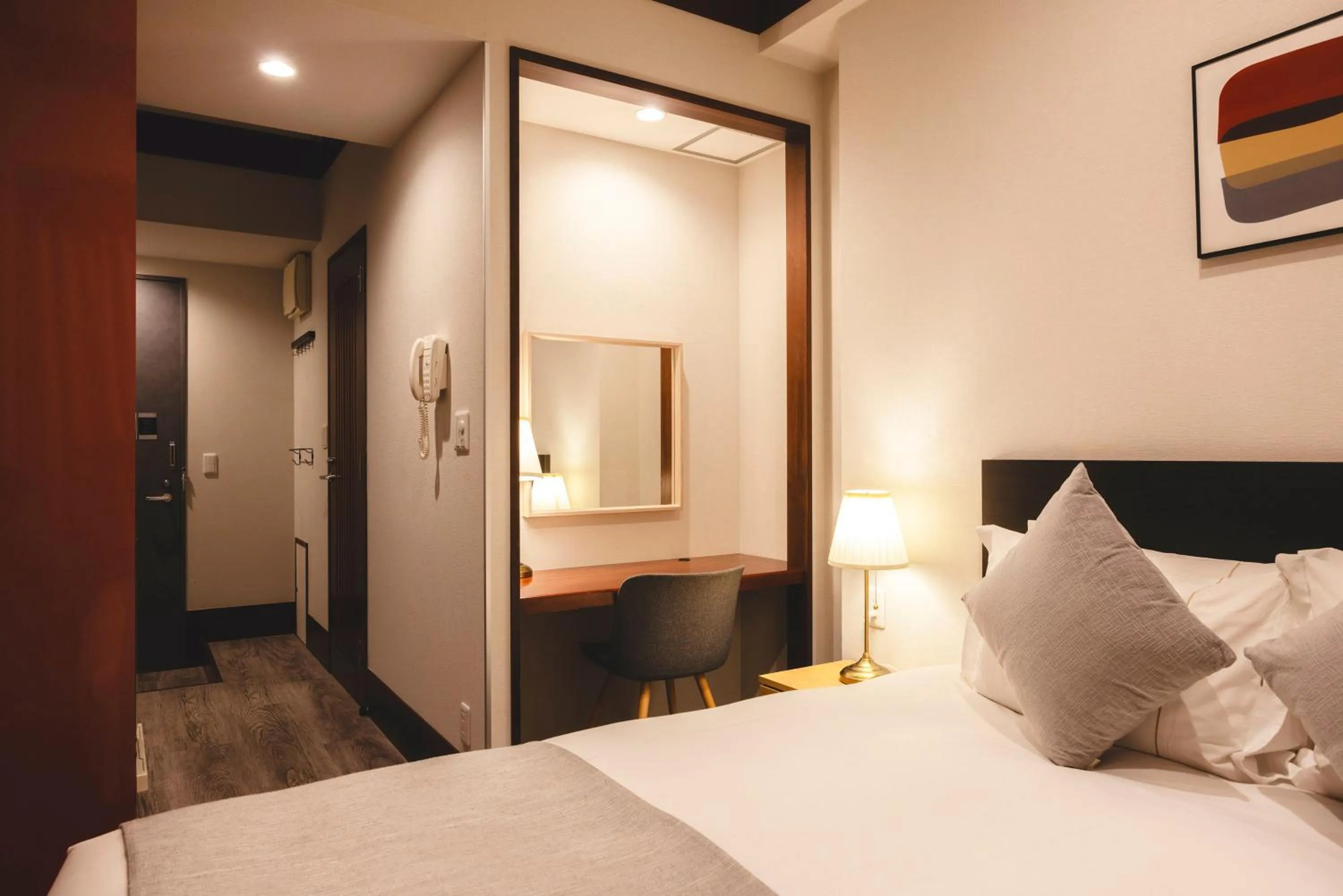 Photo of the whole room, Bed in Centurion Hotel Residential Akasaka Station