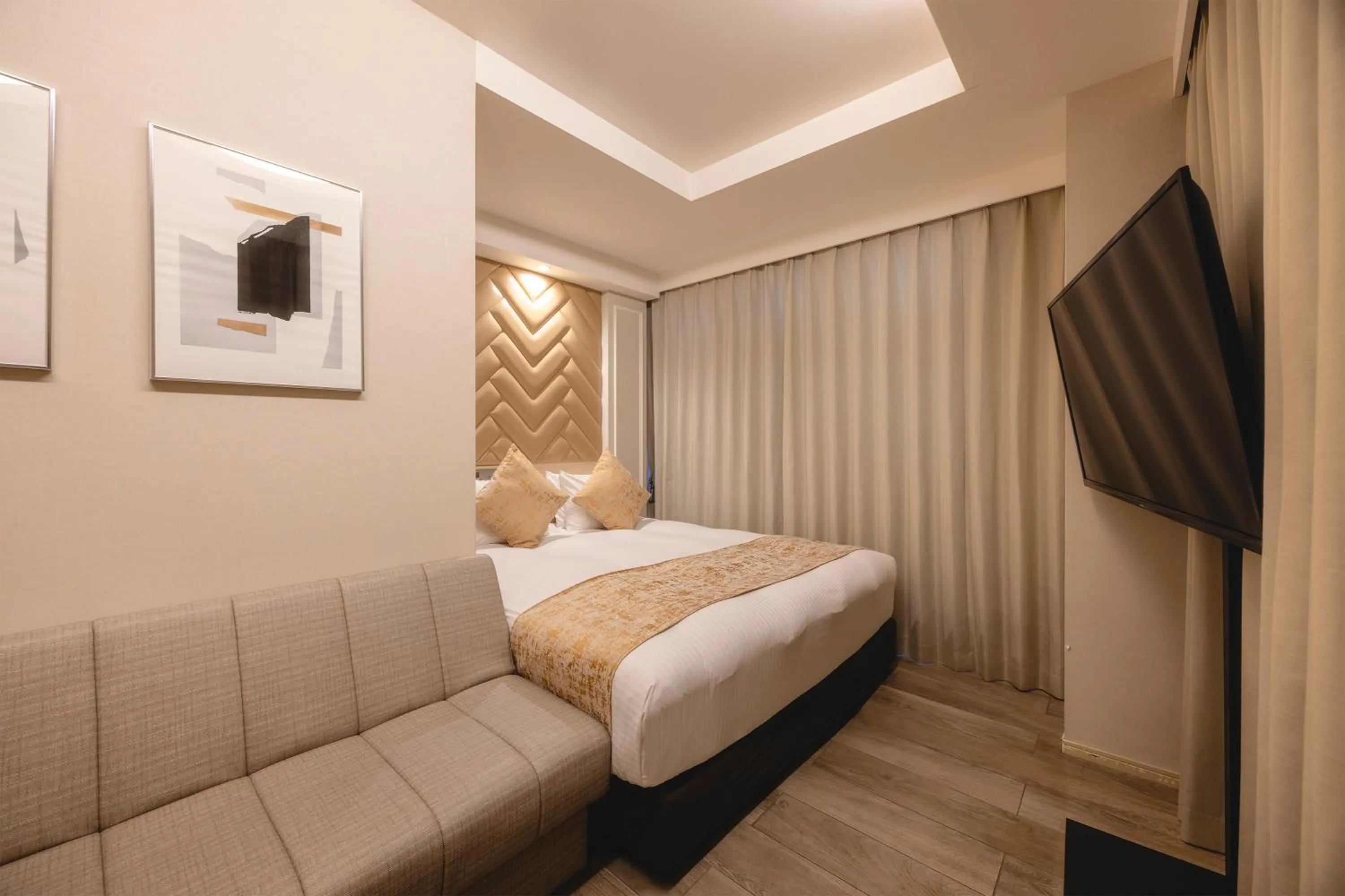 Photo of the whole room, Bed in Centurion Hotel Residential Akasaka Station