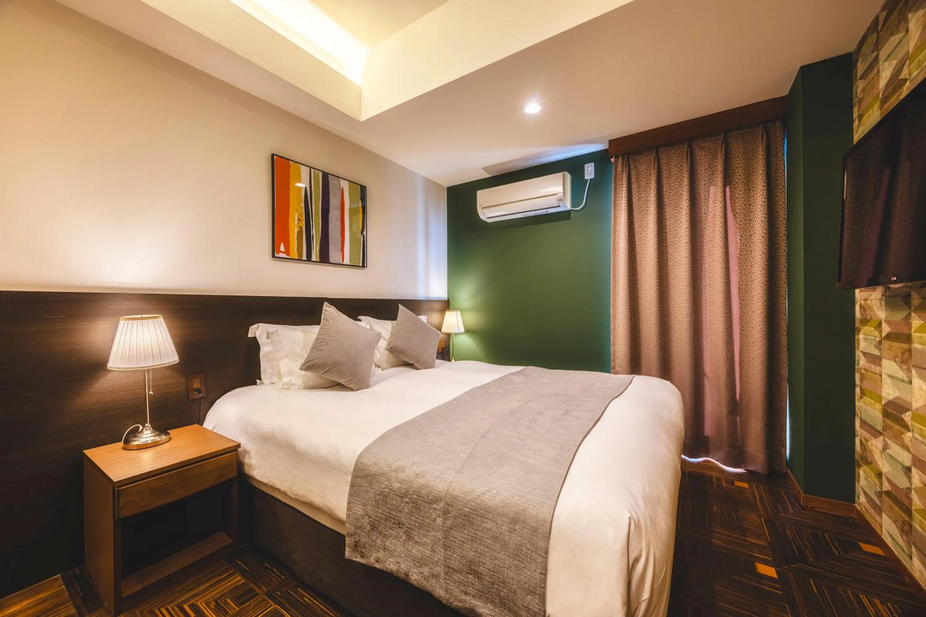 Photo of the whole room, Bed in Centurion Hotel Residential Akasaka Station