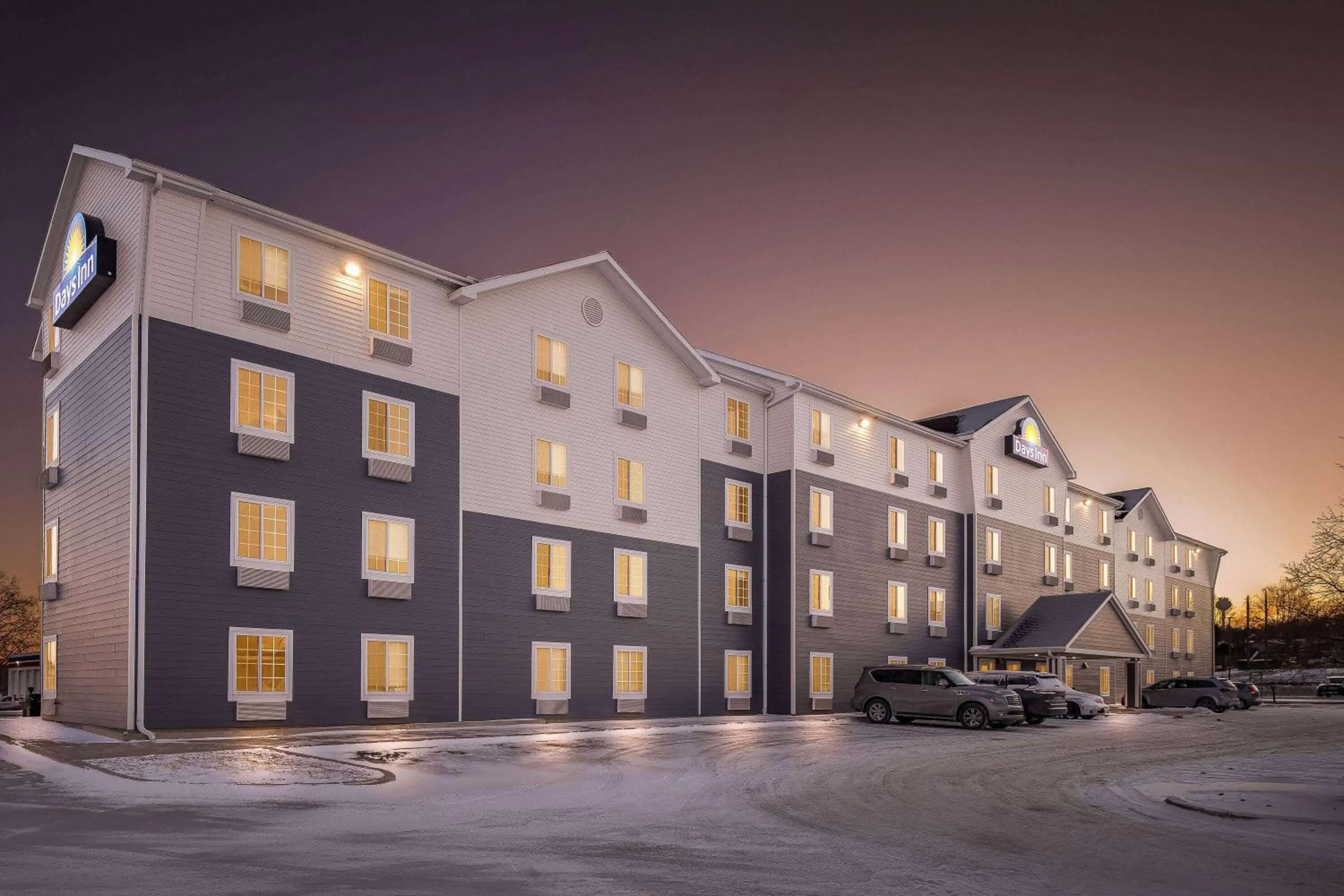 Property building in Days Inn & Suites by Wyndham Rochester South