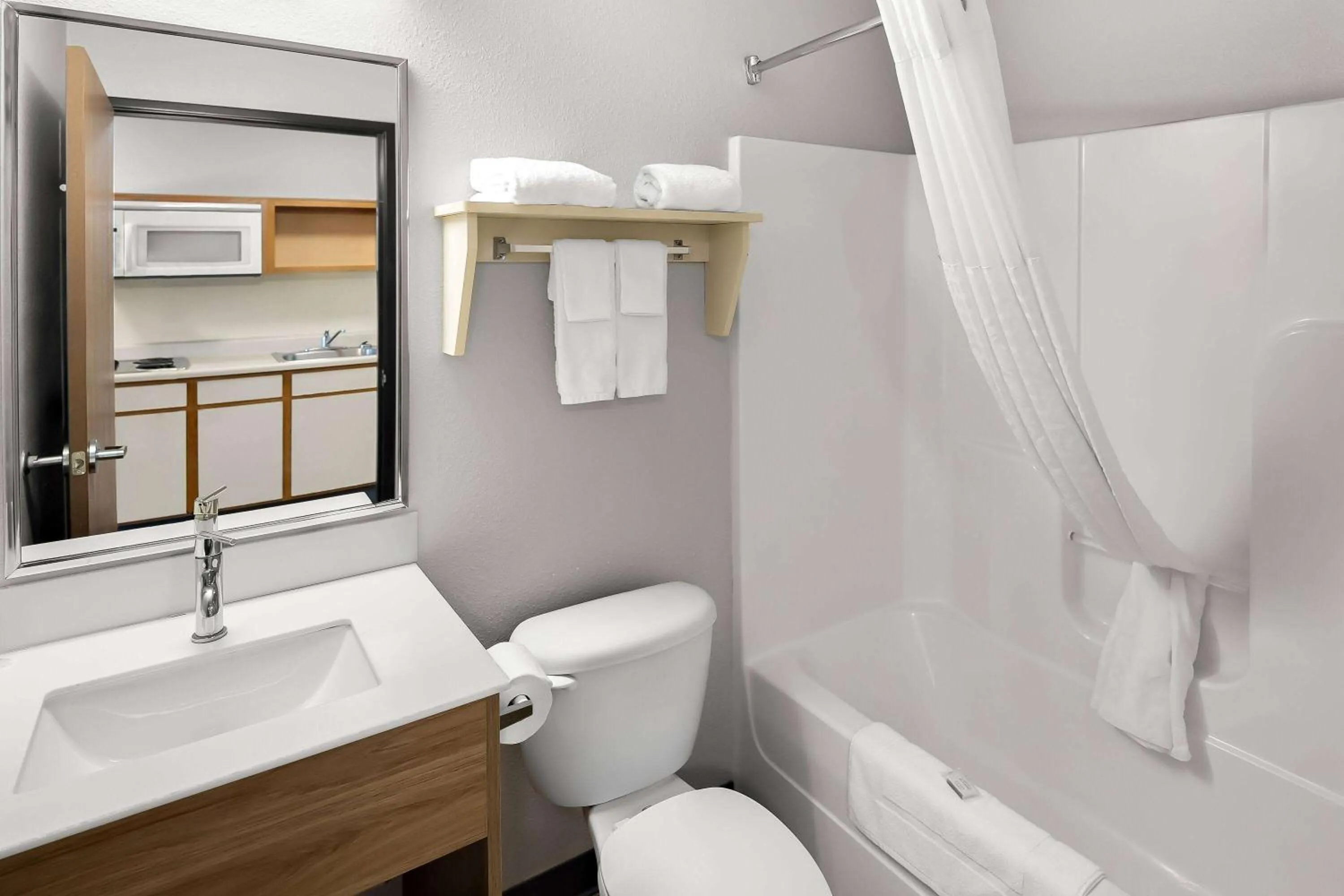 Bathroom in Days Inn & Suites by Wyndham Rochester South