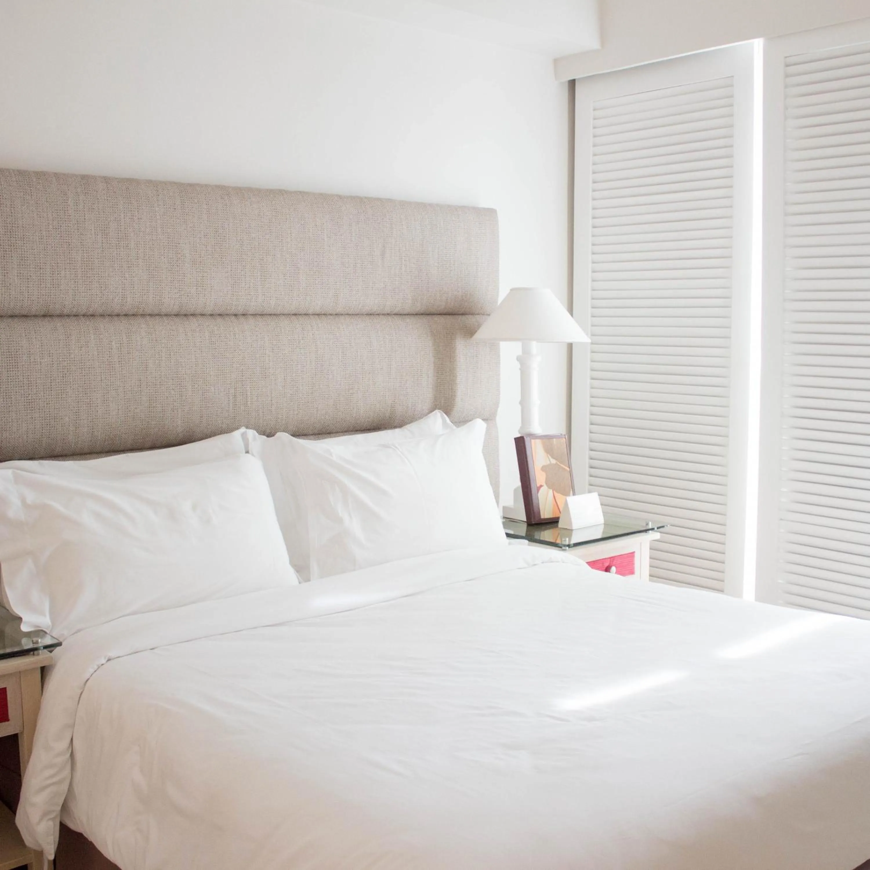 Bed in Vivere Hotel and Resorts