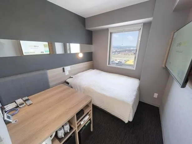 Bed in Super Hotel Mitazono Sendai Airport