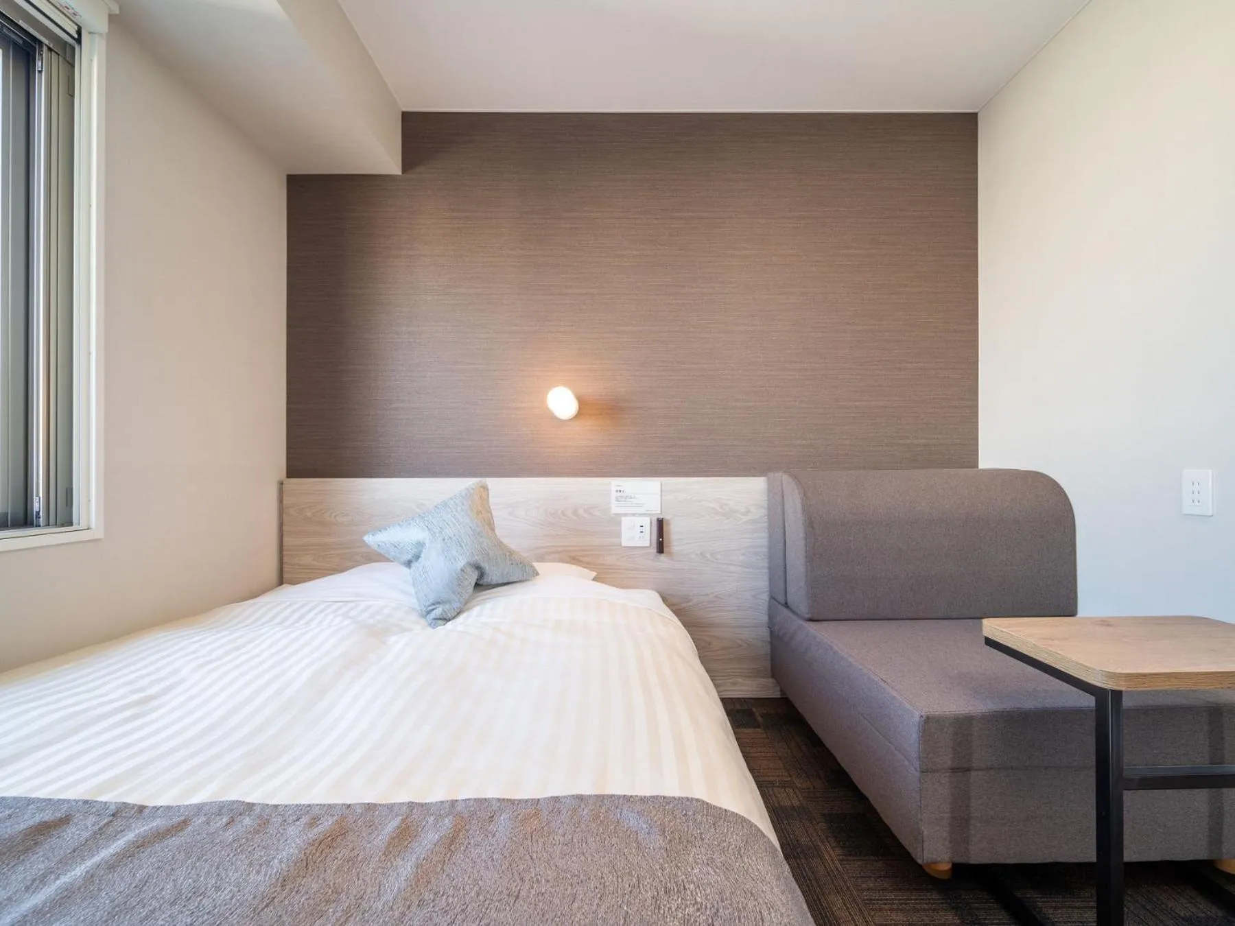 Bed in Super Hotel Mitazono Sendai Airport