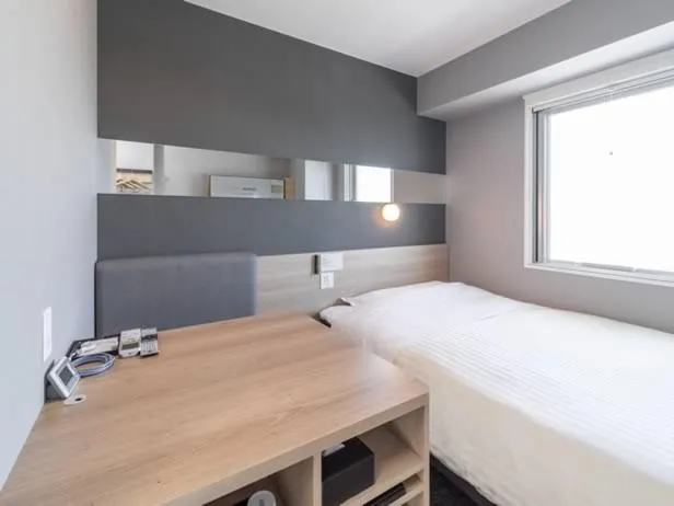 Bed in Super Hotel Mitazono Sendai Airport