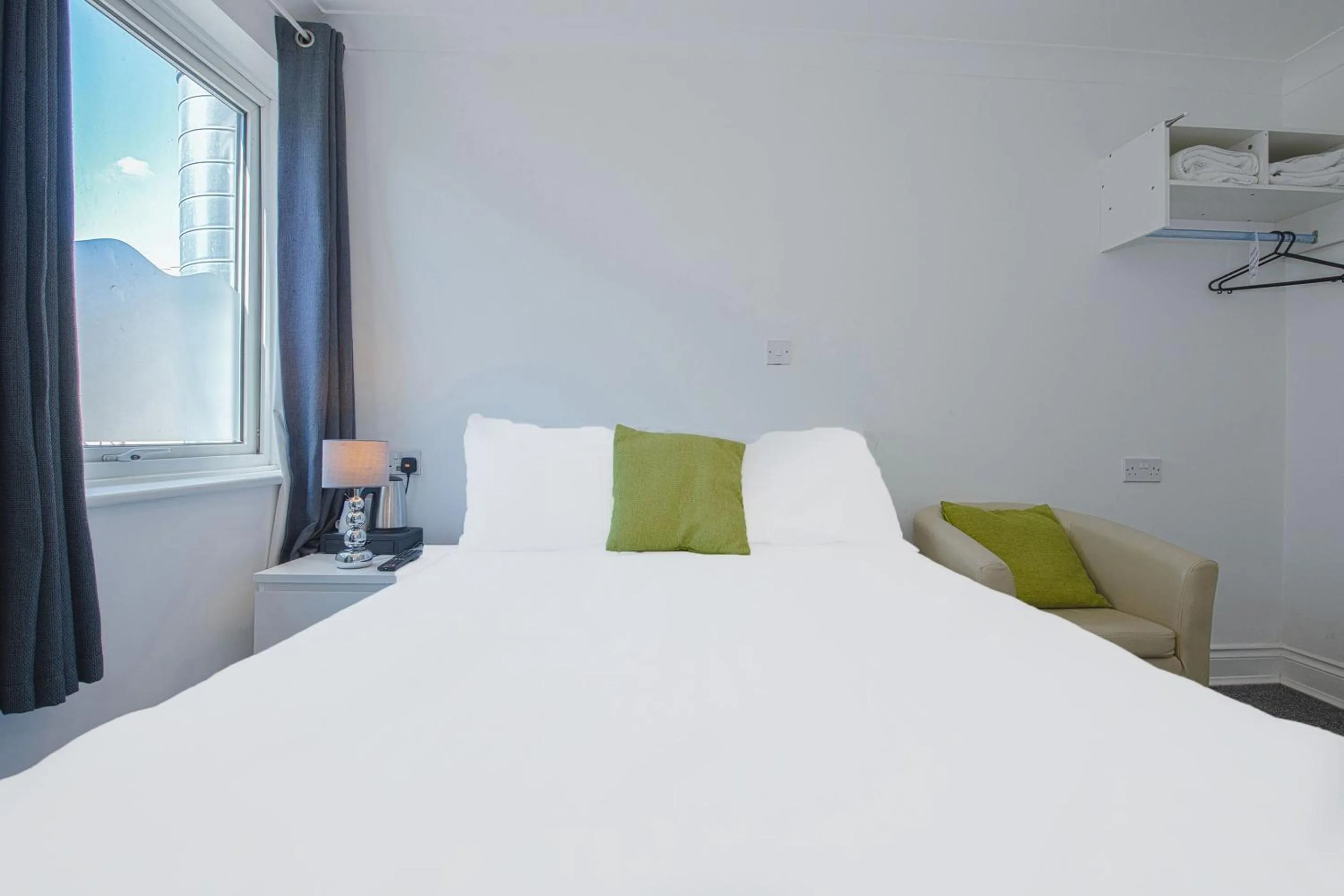 Bedroom, Bed in OYO Pier Hotel