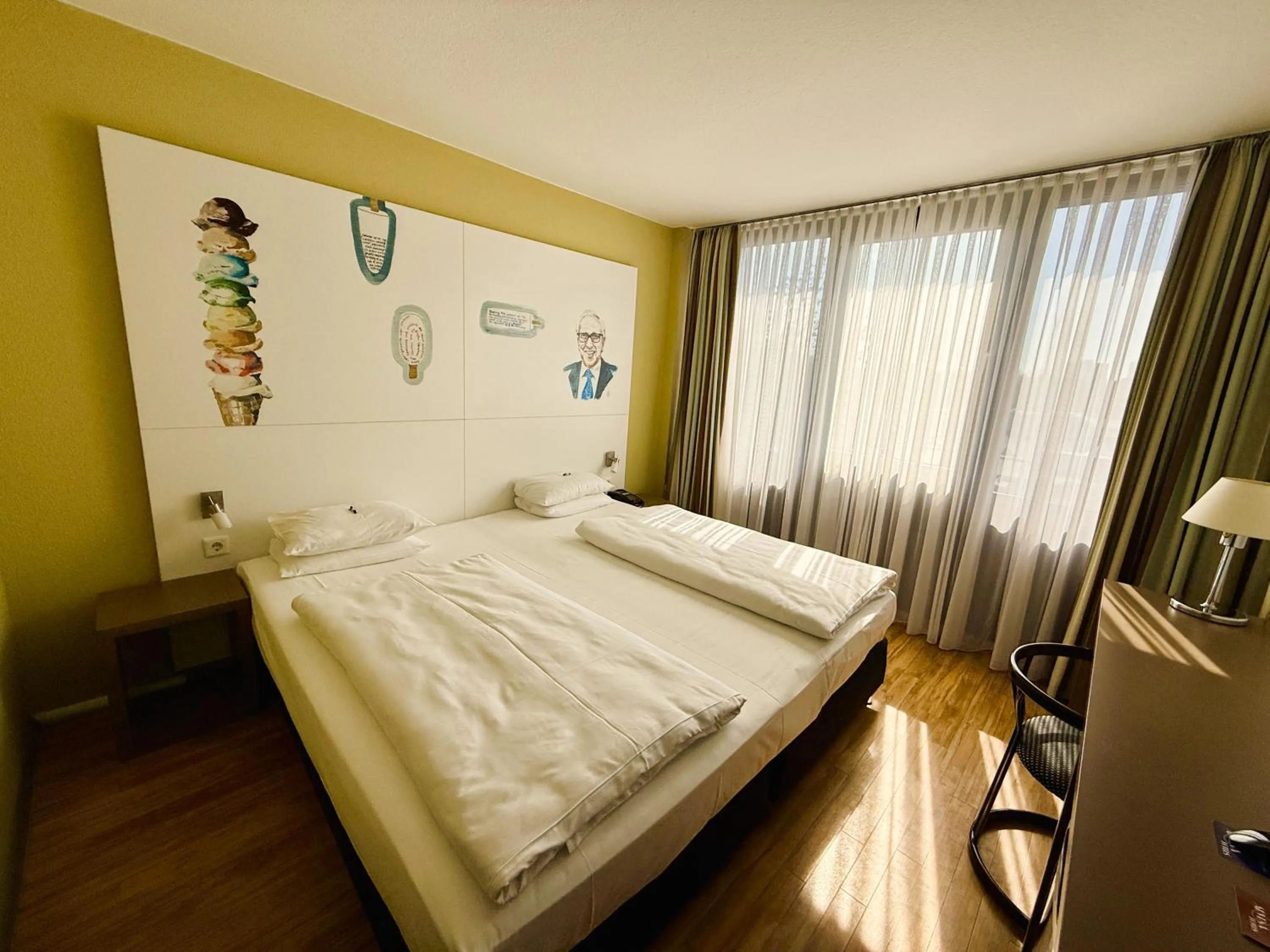 Bed in ARVENA Messe Hotel