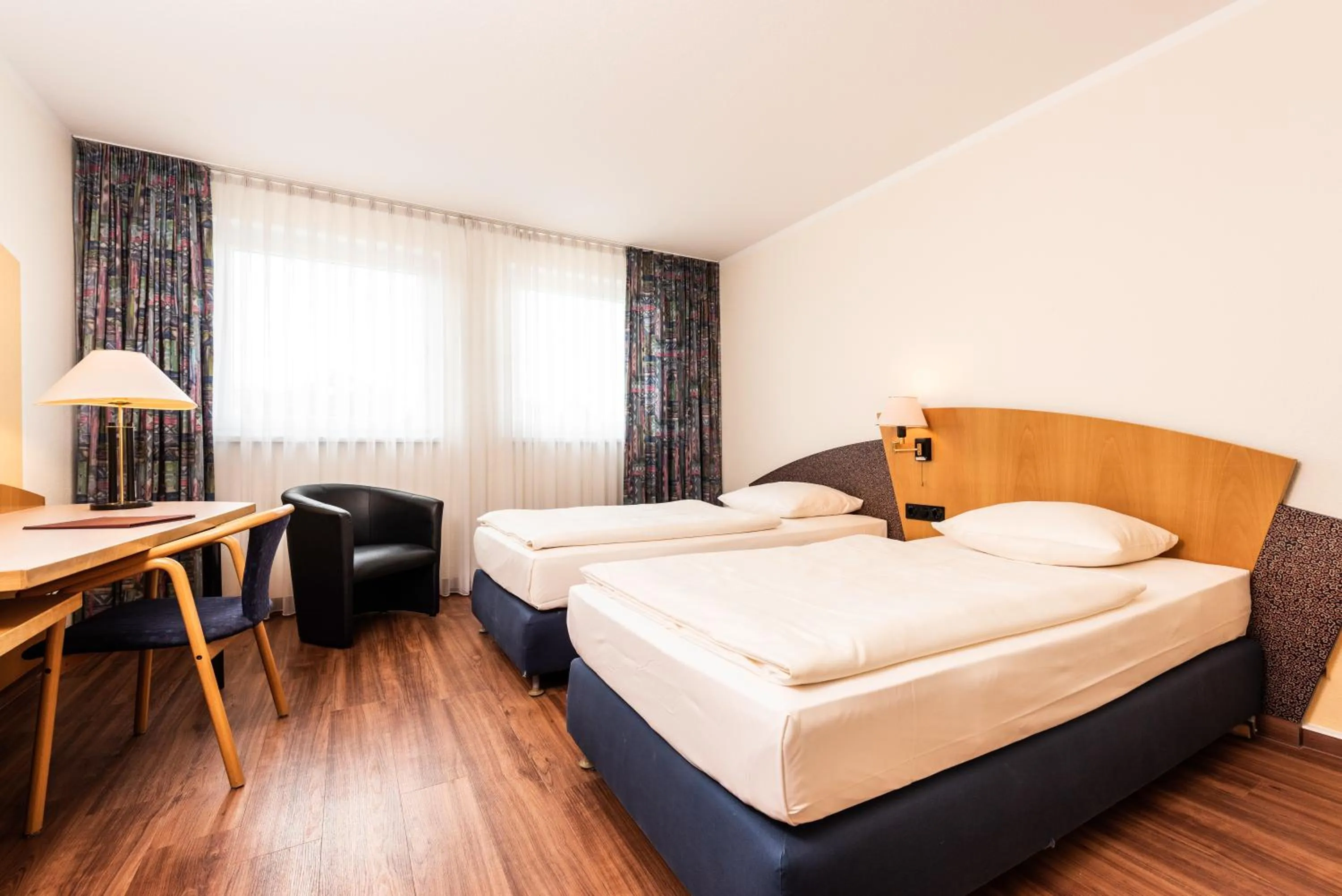 Photo of the whole room, Bed in ARVENA Kongress Hotel - Hotel in der Wagnerstadt