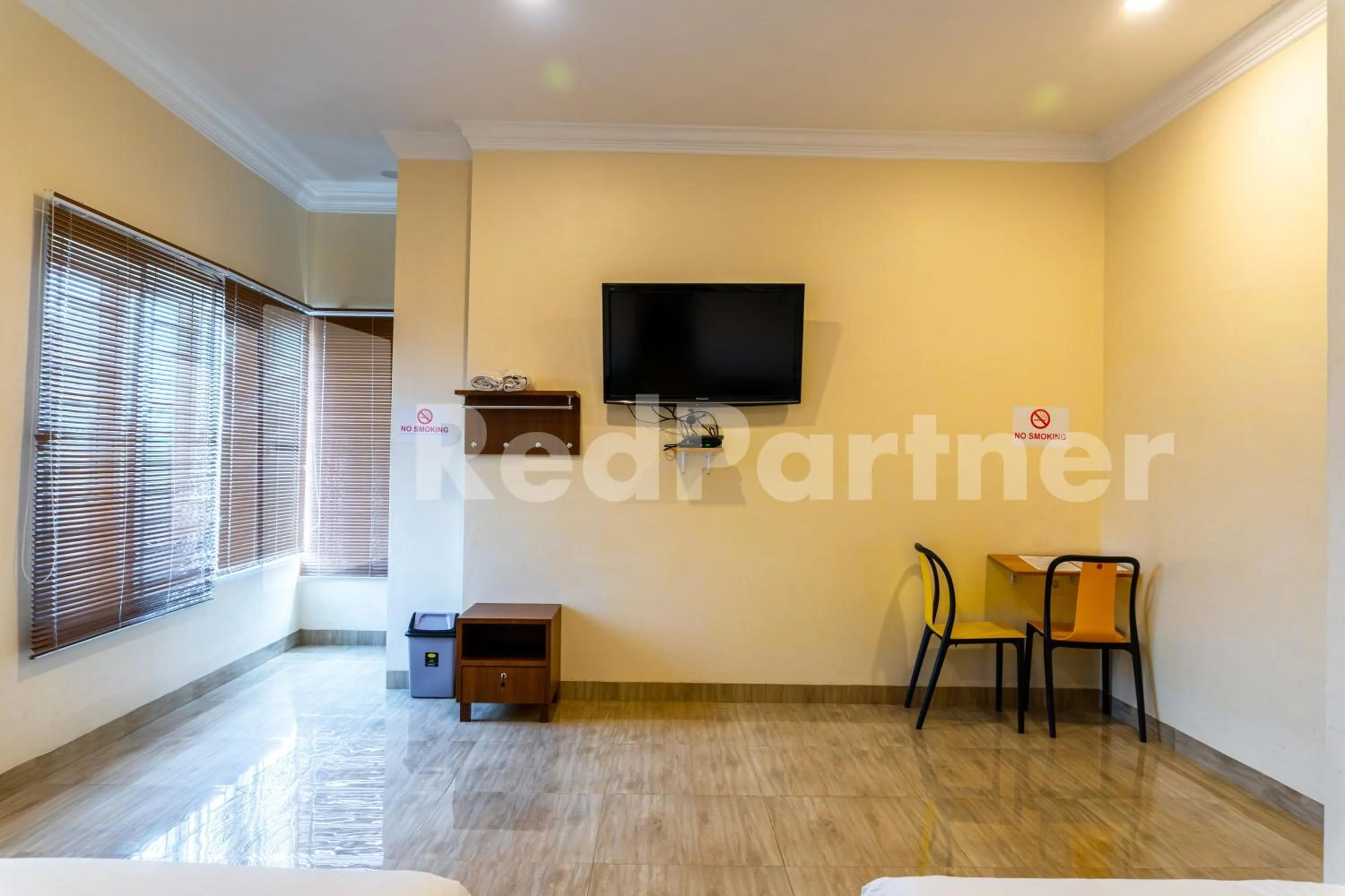 Bedroom in Adam Malik Guesthouse near Regale ICC Medan Mitra RedDoorz