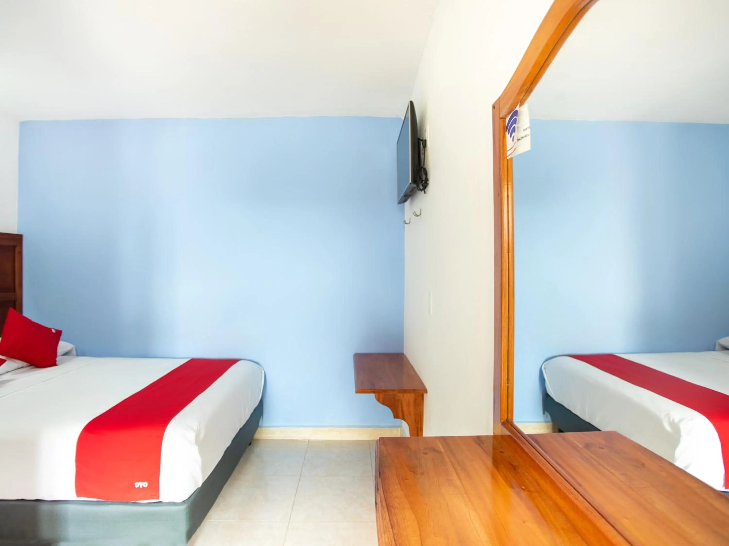 Kitchen or kitchenette, Bed in Hotel Casa Poblana