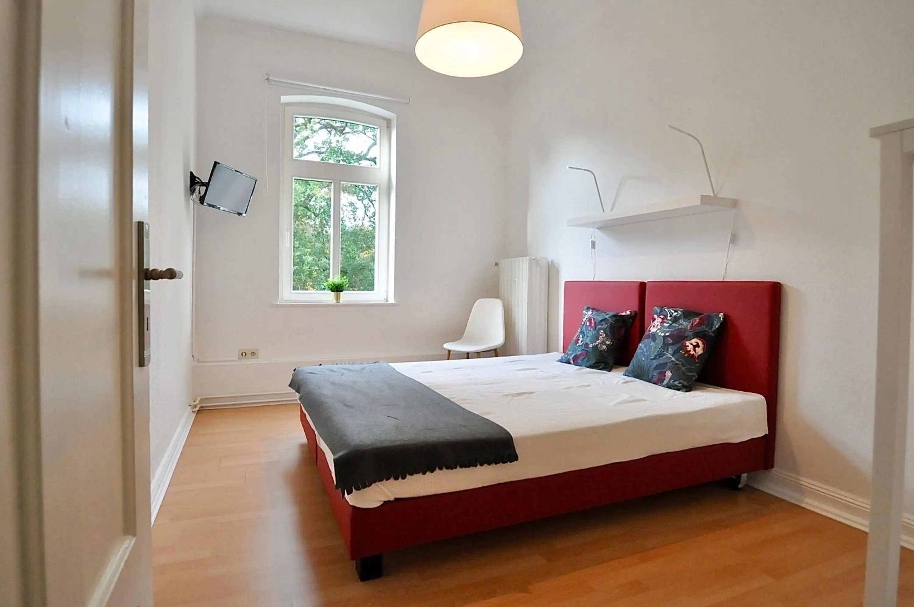 Bed in Gästehaus Schlossgarten