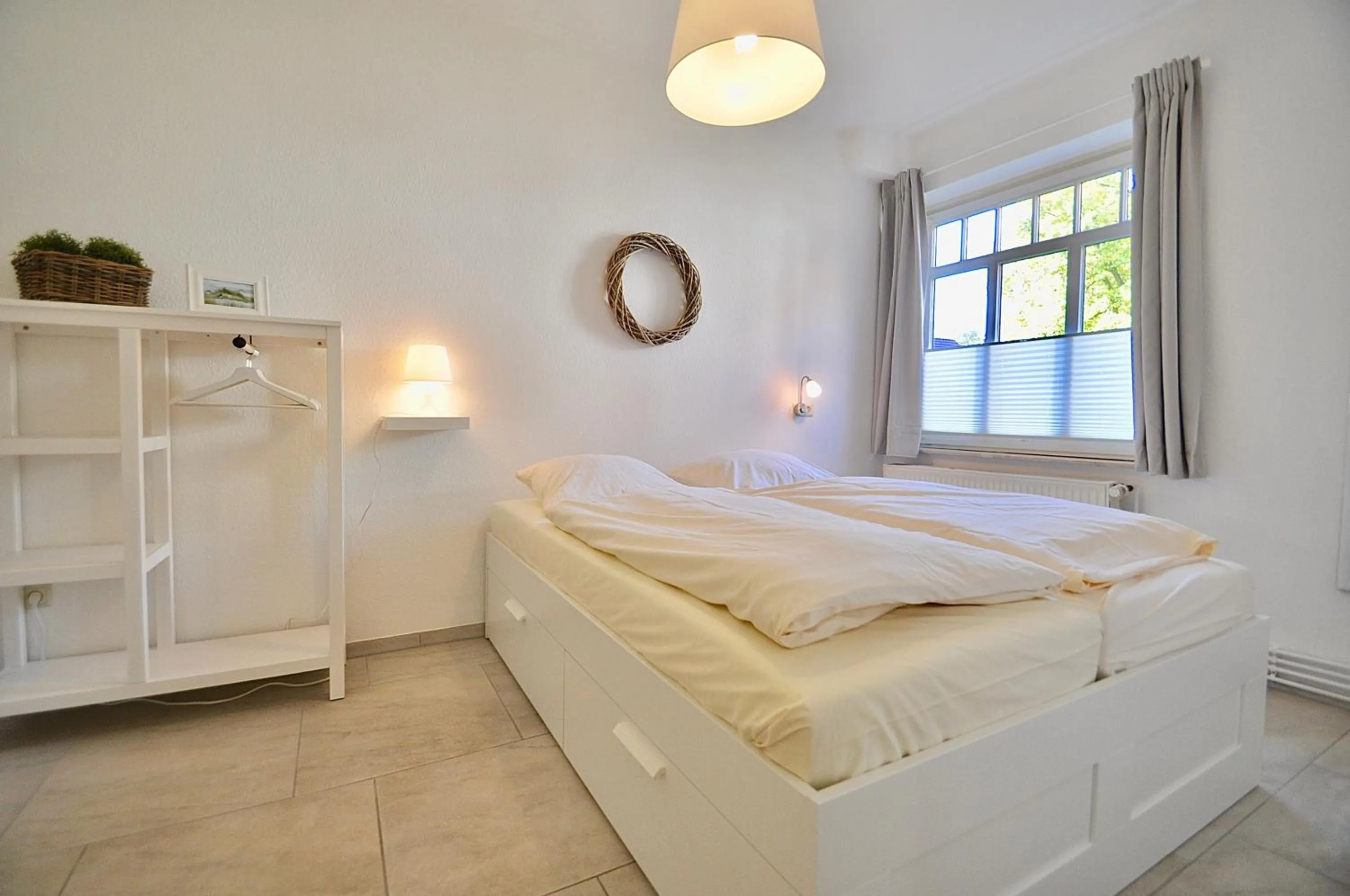 Bed in Gästehaus Schlossgarten