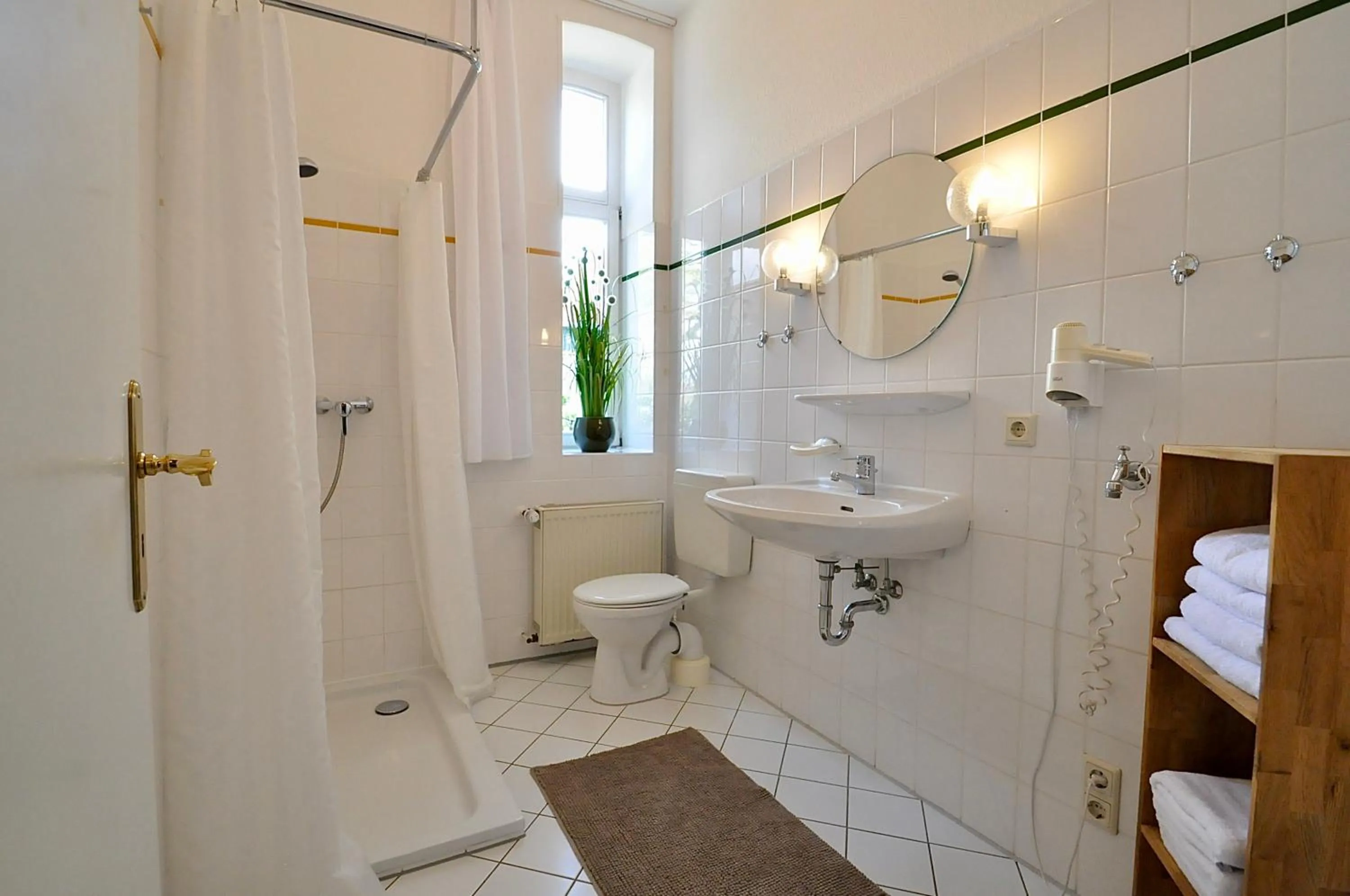 Bathroom in Gästehaus Schlossgarten