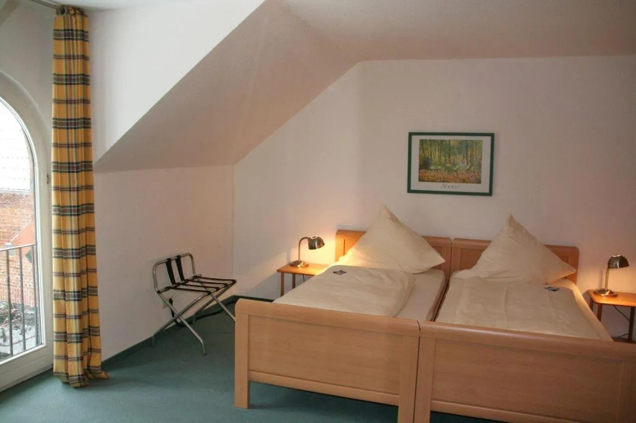 Bed in Gästehaus Schlossgarten