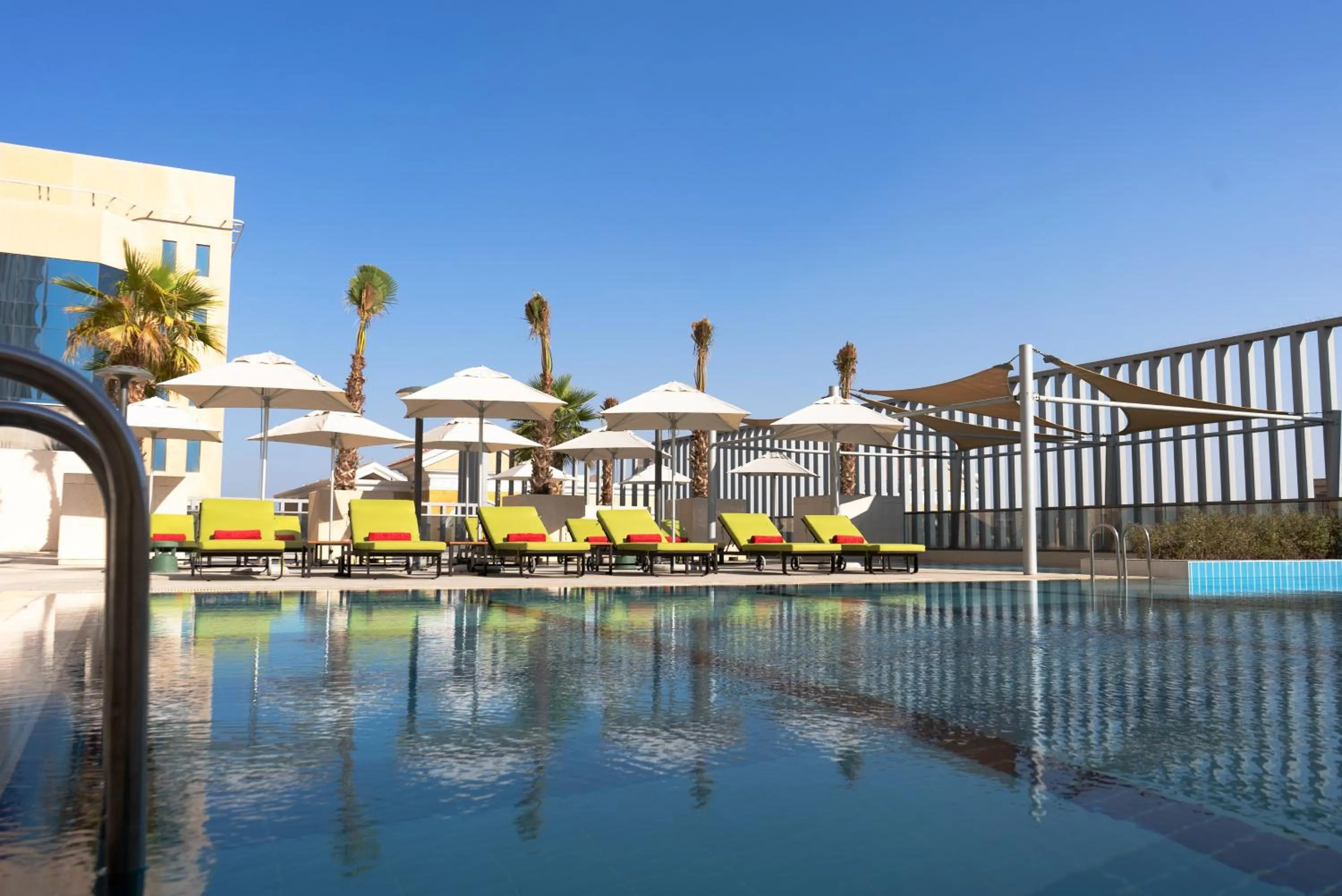 Swimming pool in Dana Rayhaan by Rotana