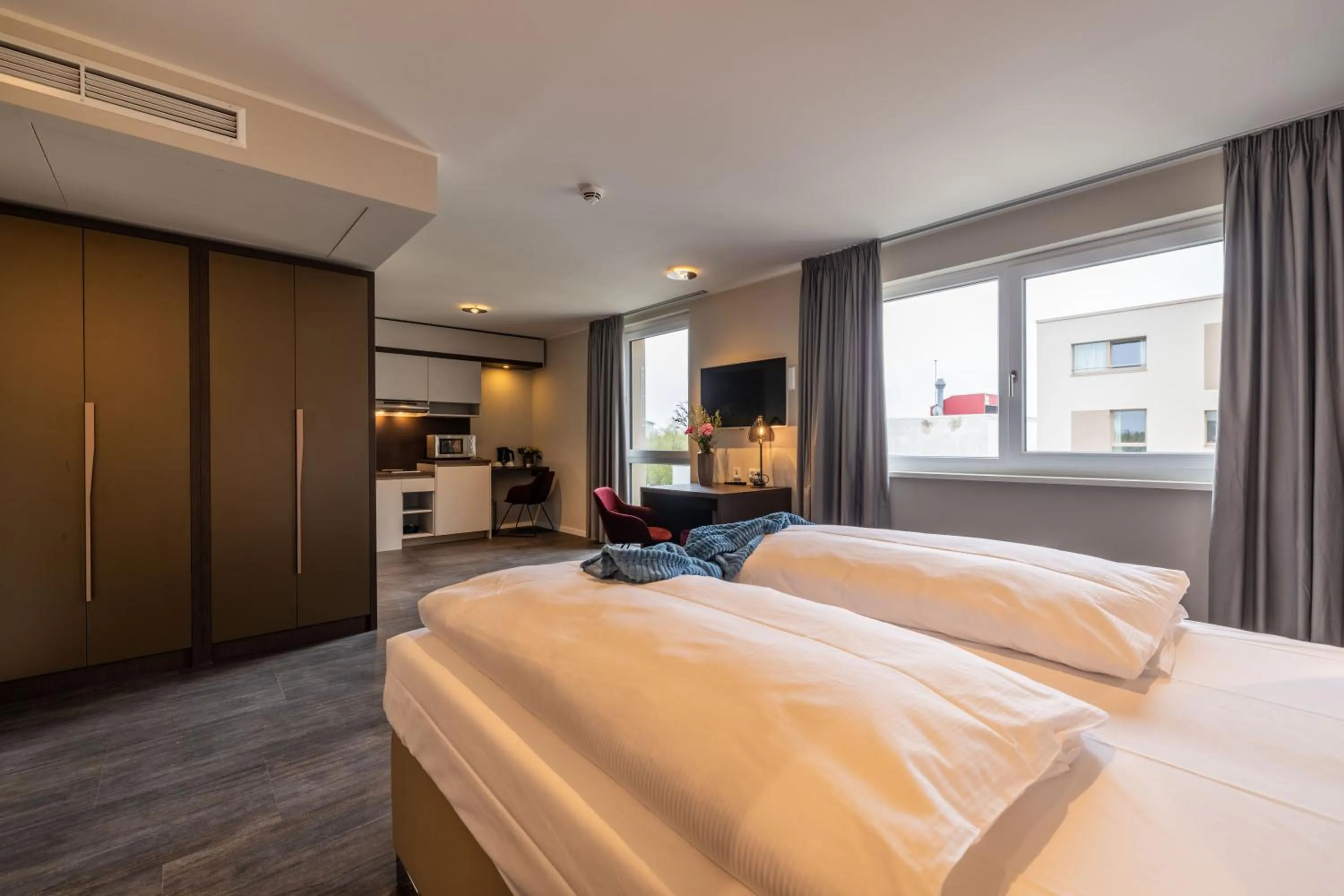 Photo of the whole room, Bed in MASEVEN München Messe Trudering