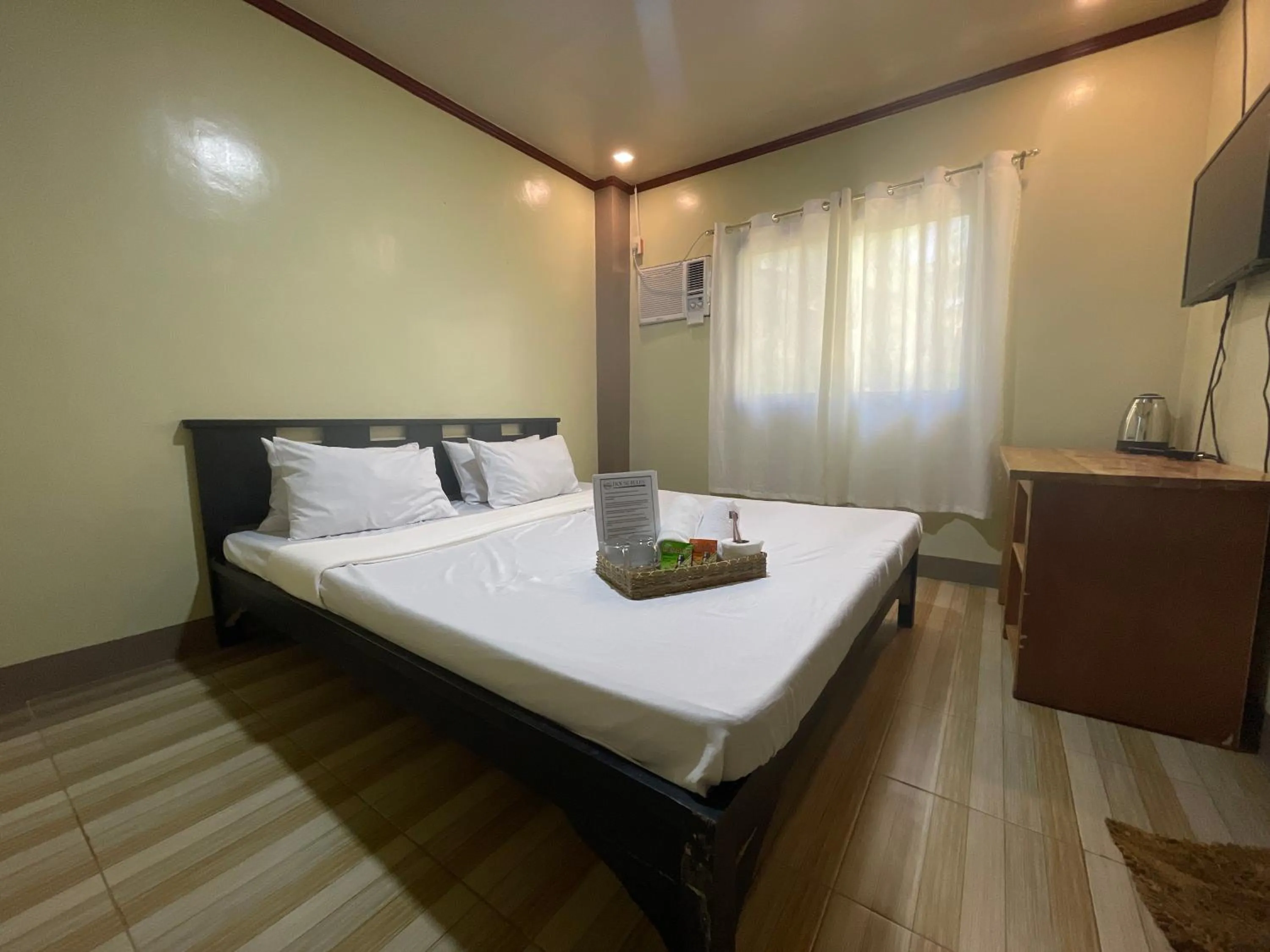 Bed in Camp Paraiso Resort
