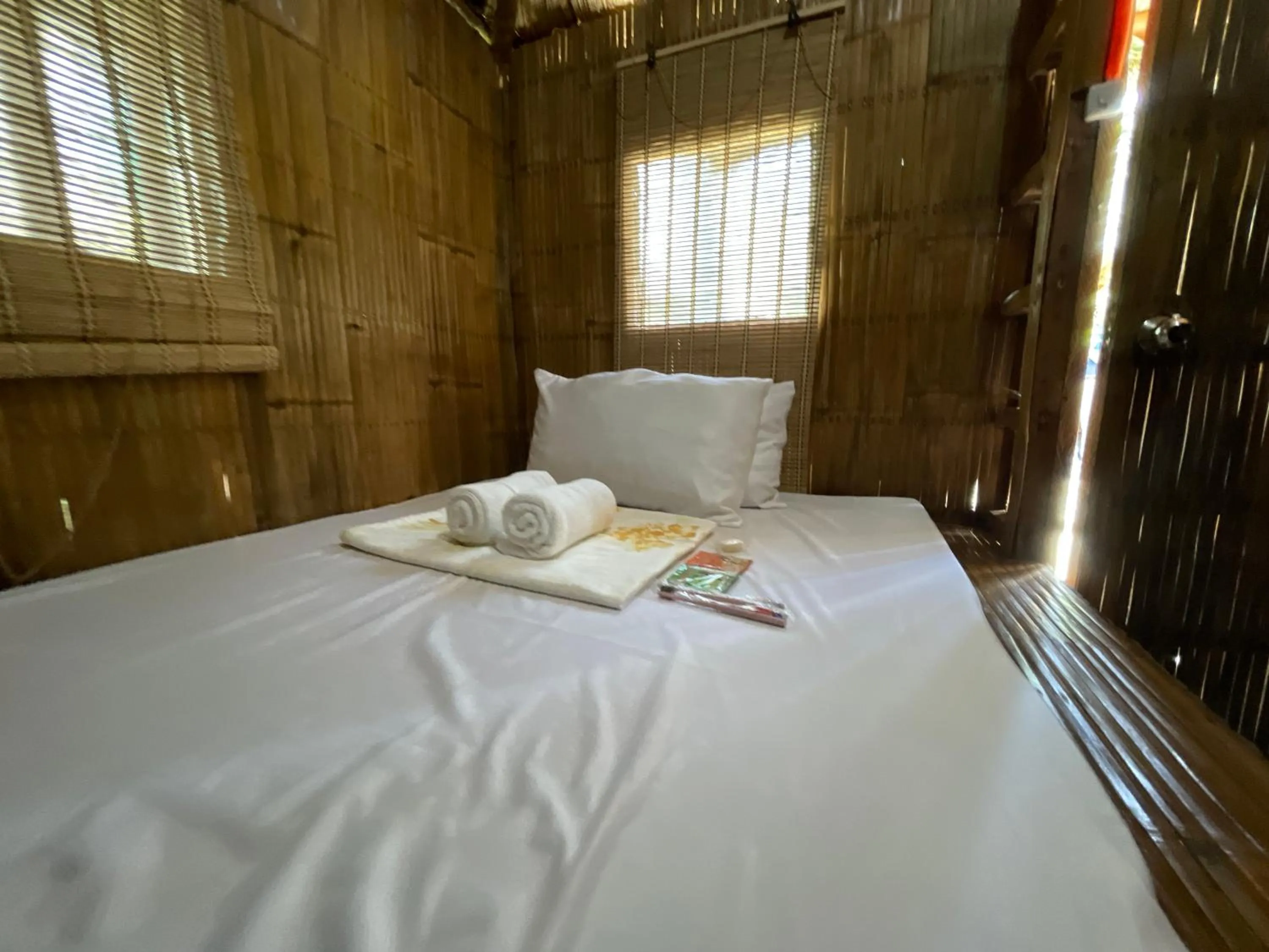 Bed in Camp Paraiso Resort