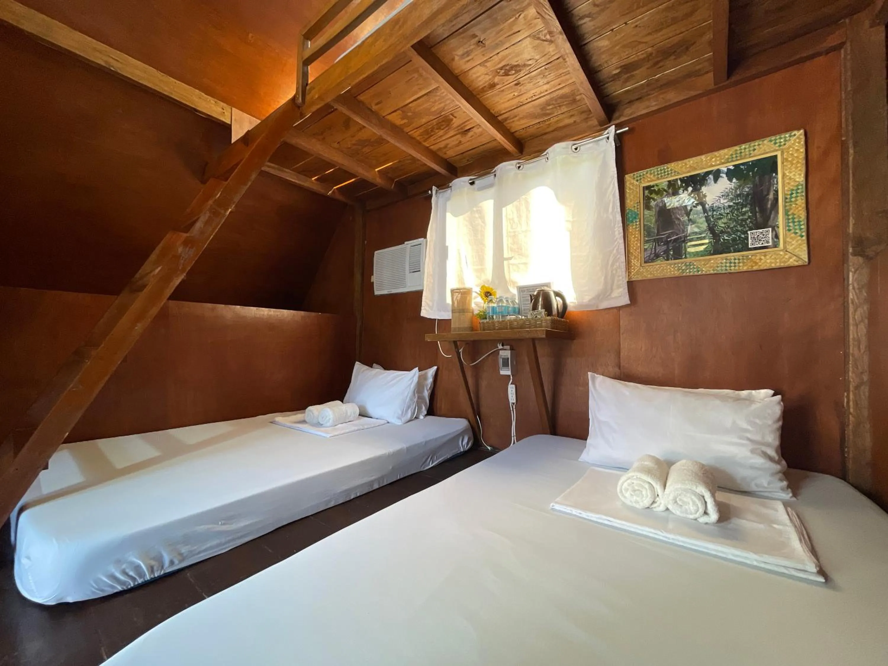 Bed in Camp Paraiso Resort