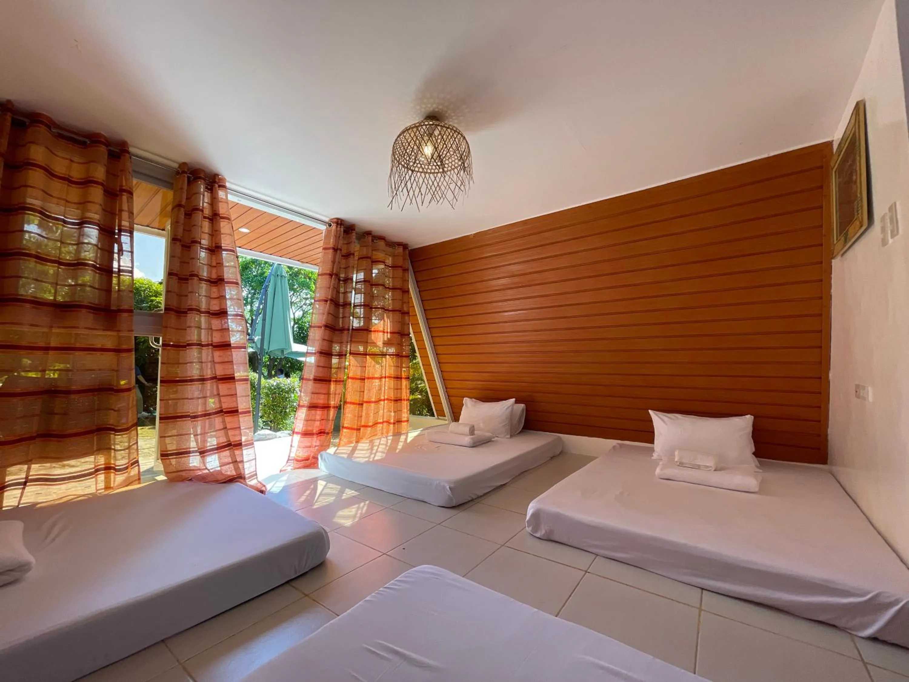 Bed in Camp Paraiso Resort