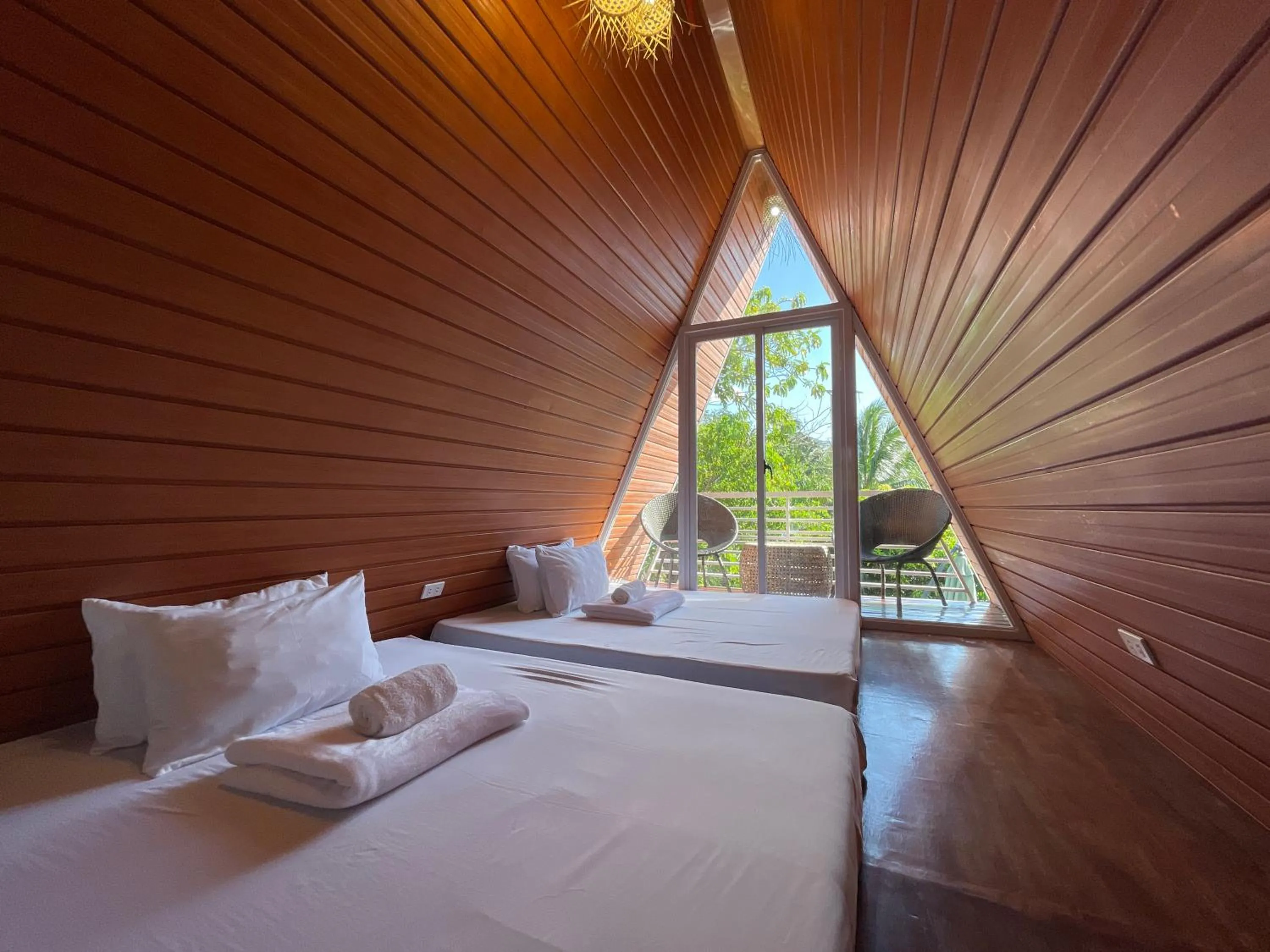 Bed in Camp Paraiso Resort