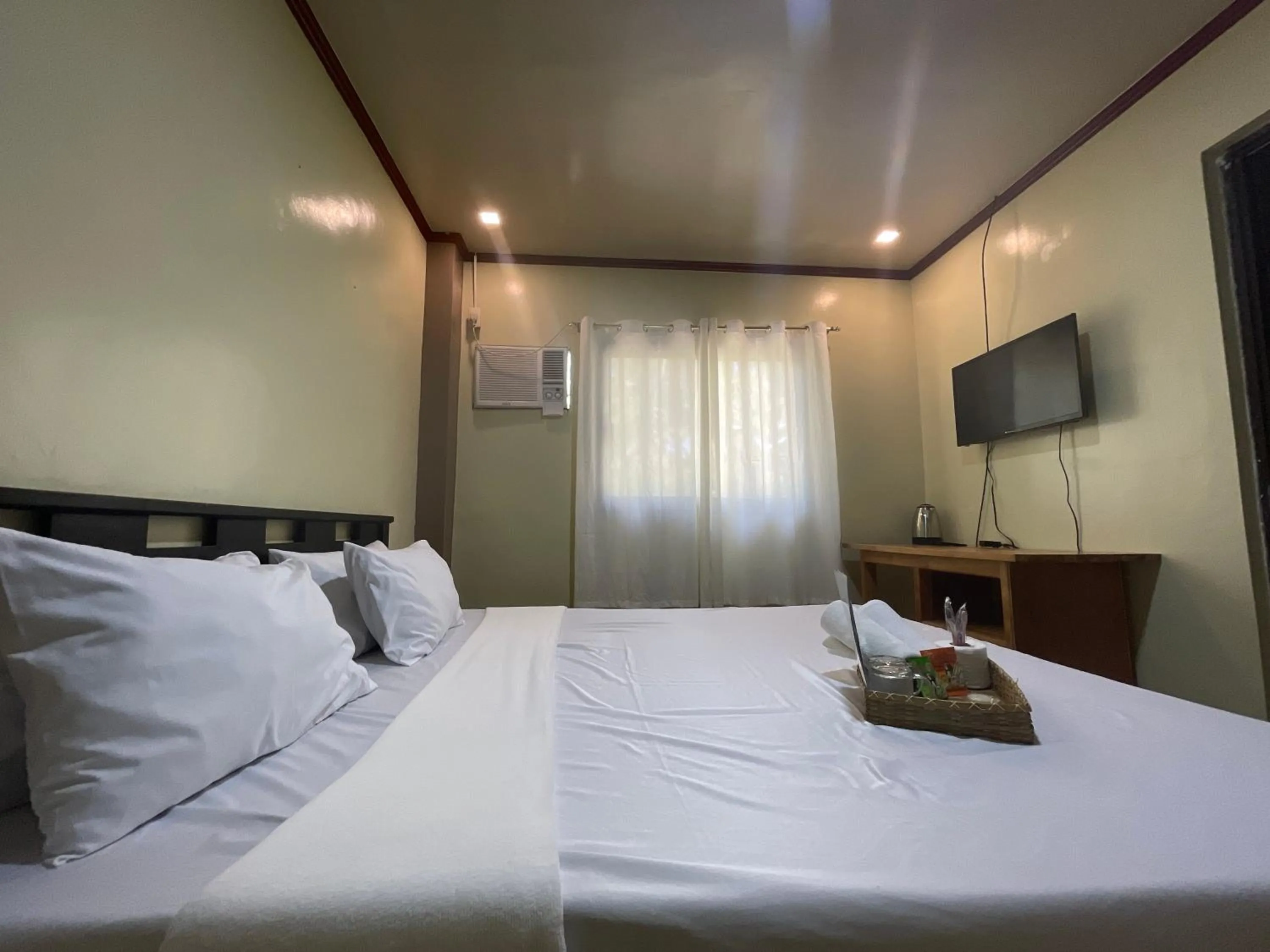 Bed in Camp Paraiso Resort