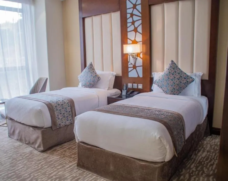 Bed in Sarwat Park Hotel