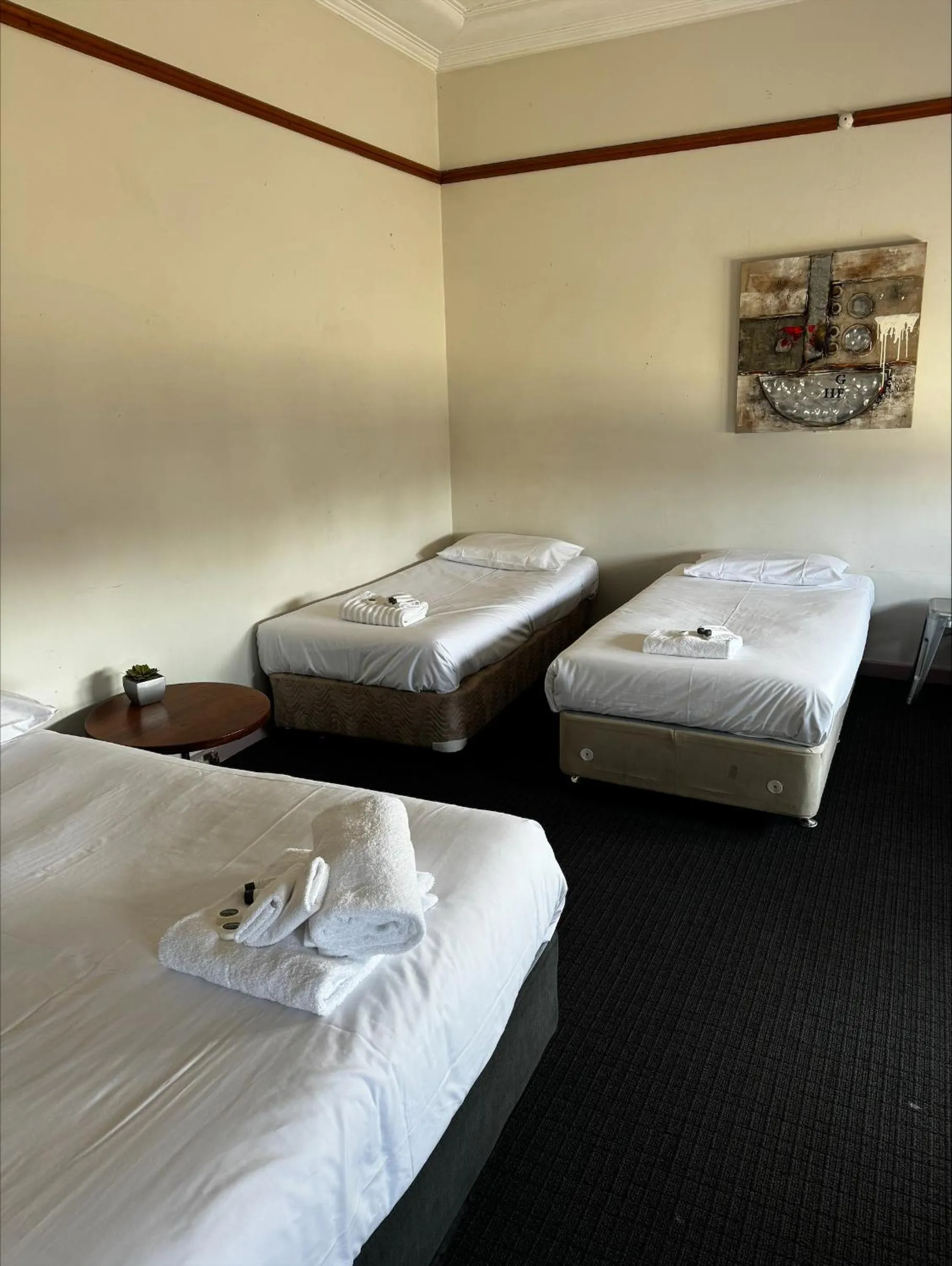 Bed in William Farrer Hotel