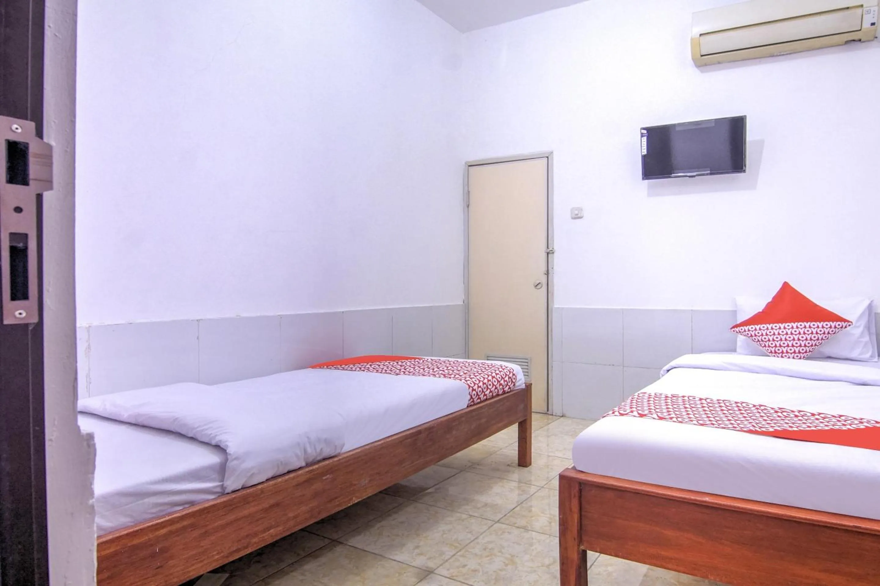Bedroom in OYO 3317 Maju Jaya Homestay Syariah