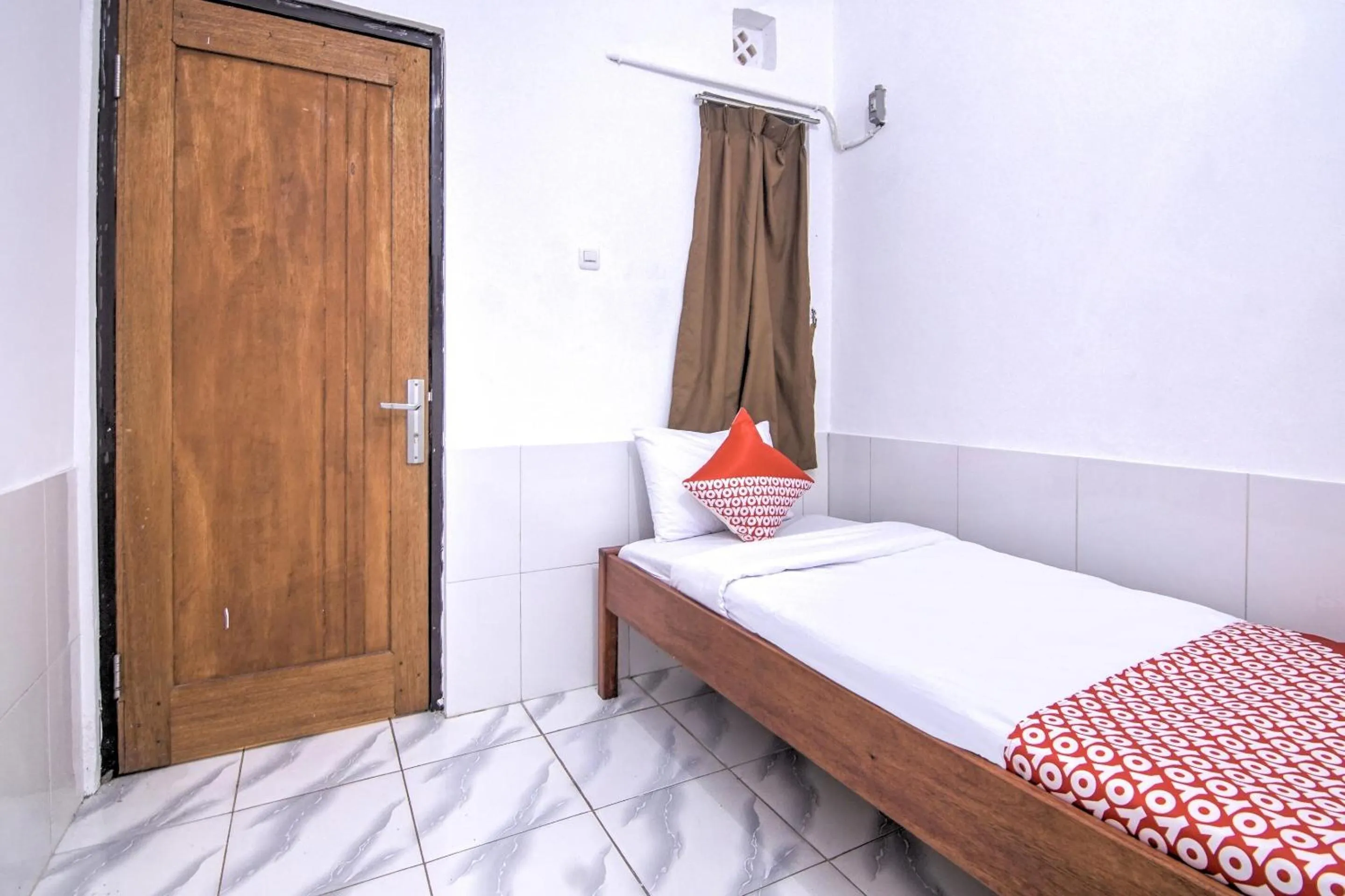Bedroom in OYO 3317 Maju Jaya Homestay Syariah