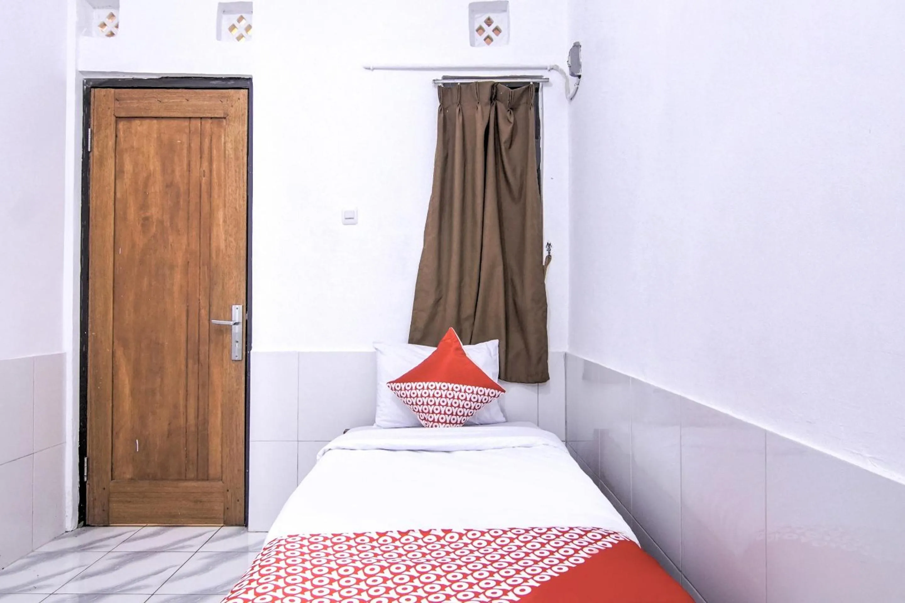 Bedroom in OYO 3317 Maju Jaya Homestay Syariah