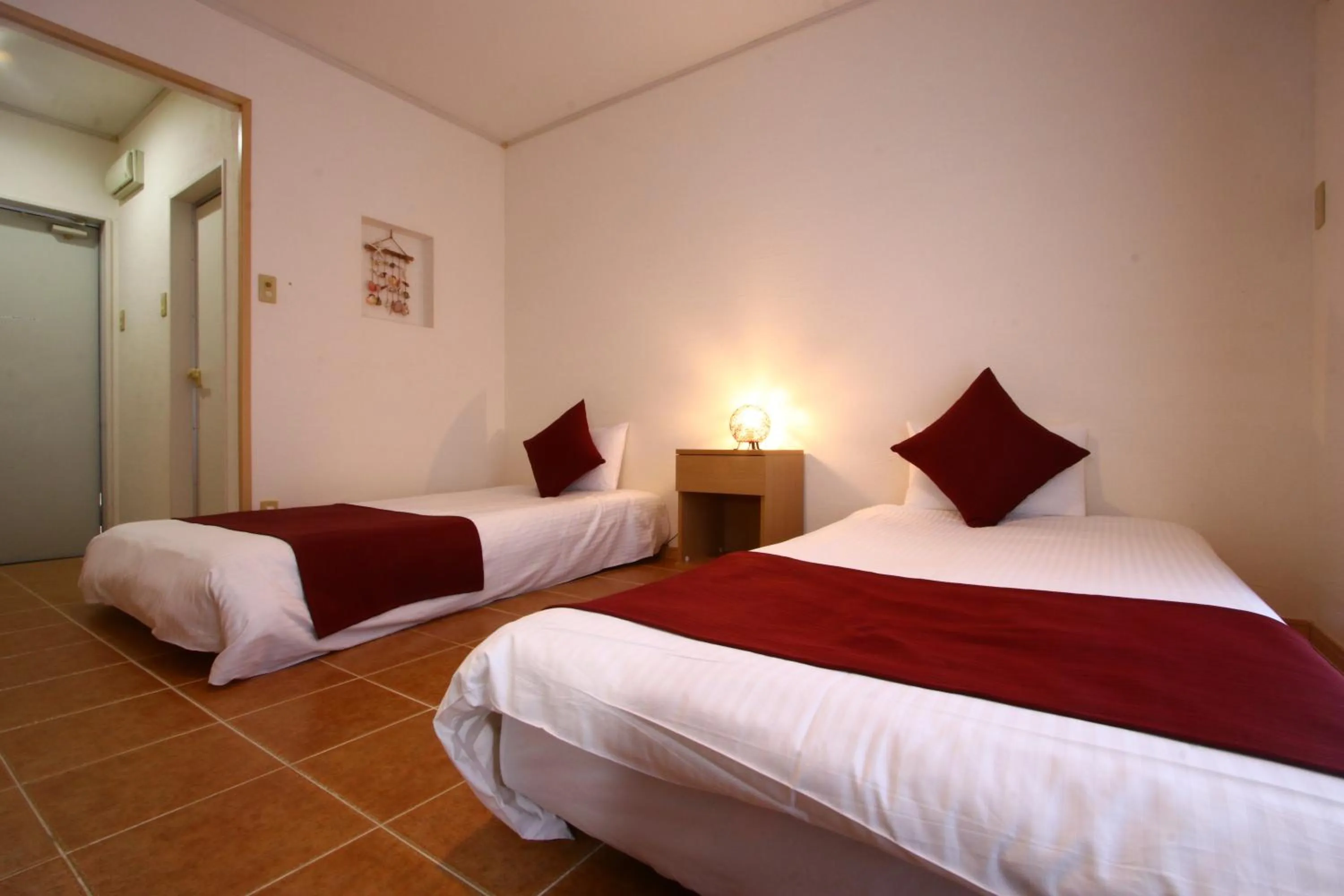 Bed in AsobiBASE Yamabare-House