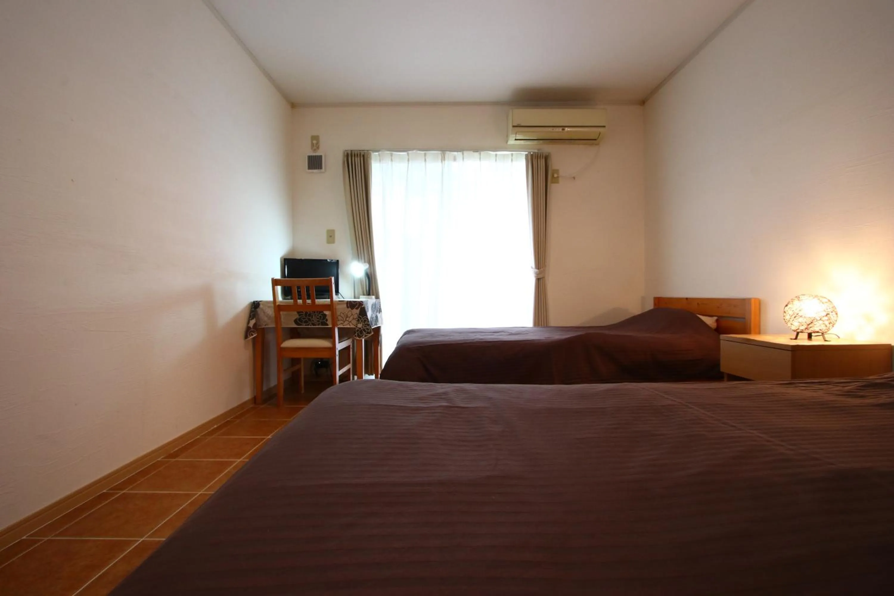 Bed in AsobiBASE Yamabare-House