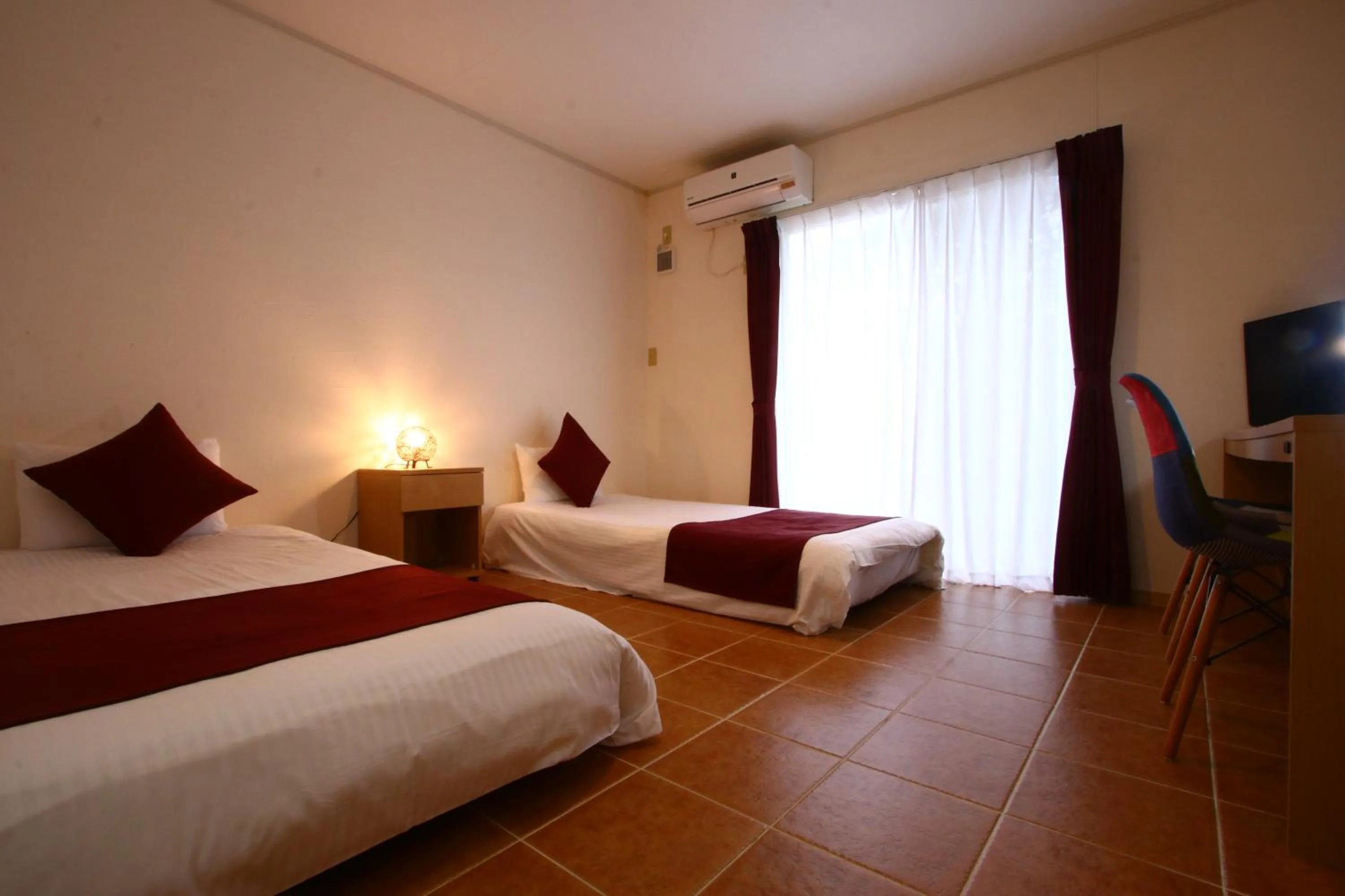 Bed in AsobiBASE Yamabare-House